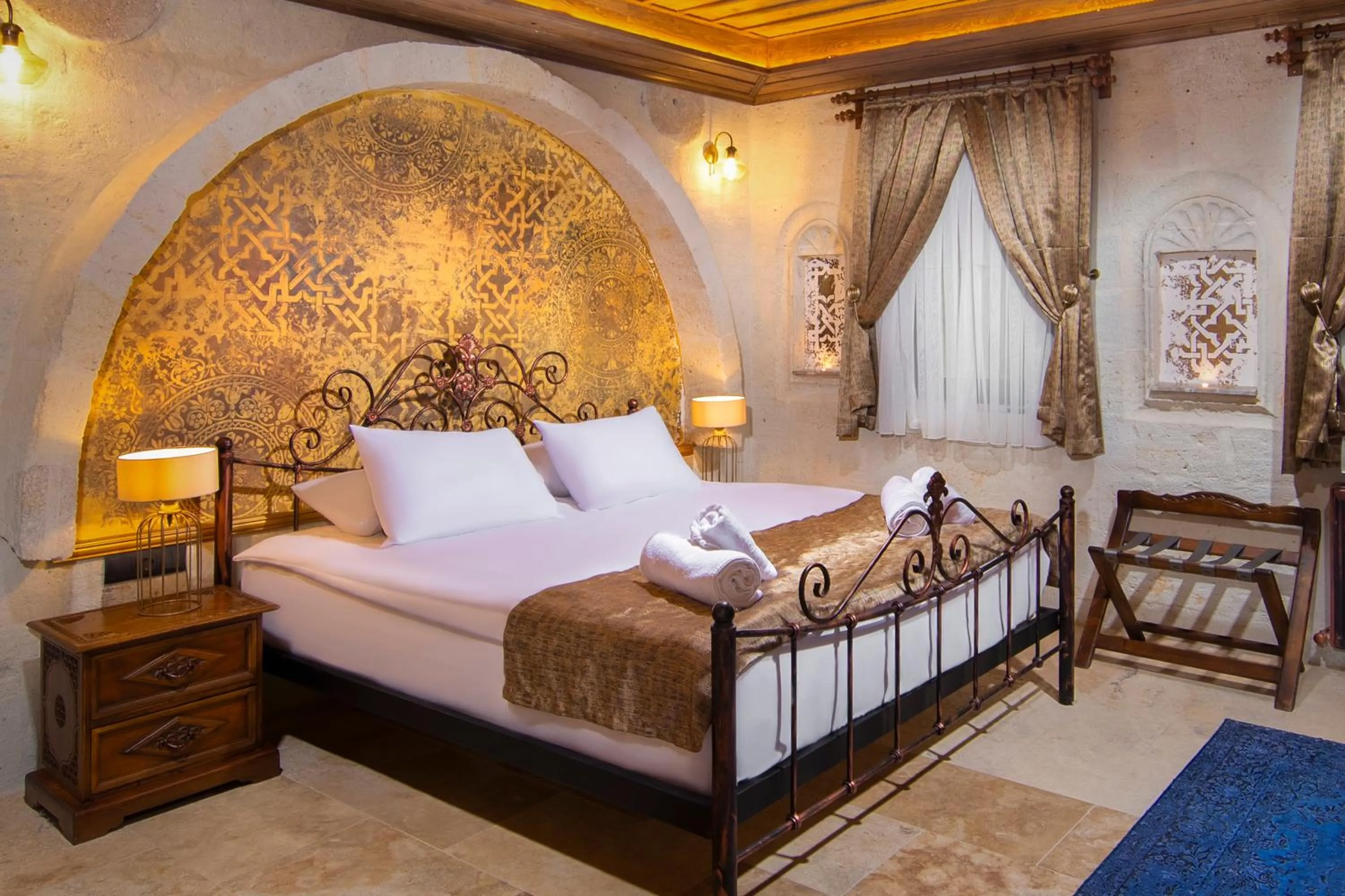 Bed in Dionysos Cave Cappadocia Hotel