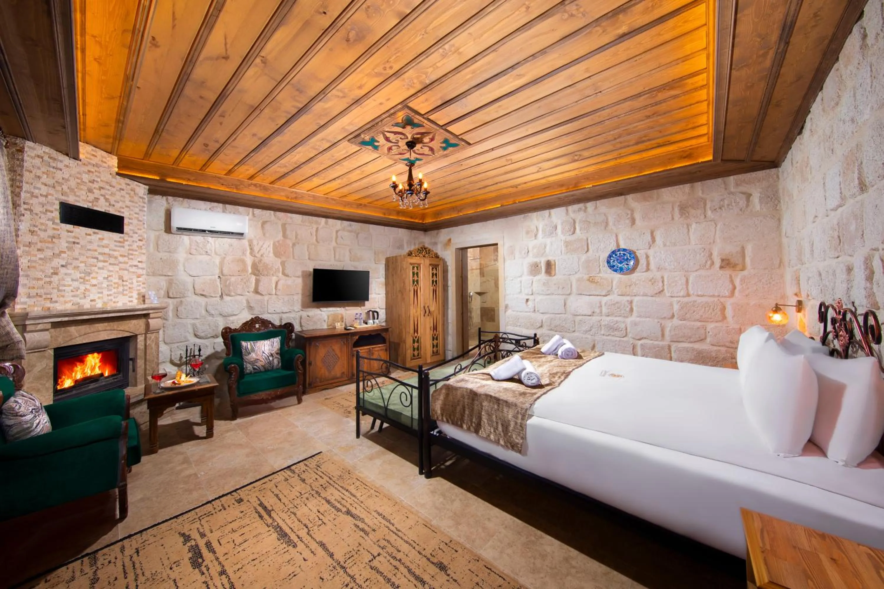 Bed in Dionysos Cave Cappadocia Hotel