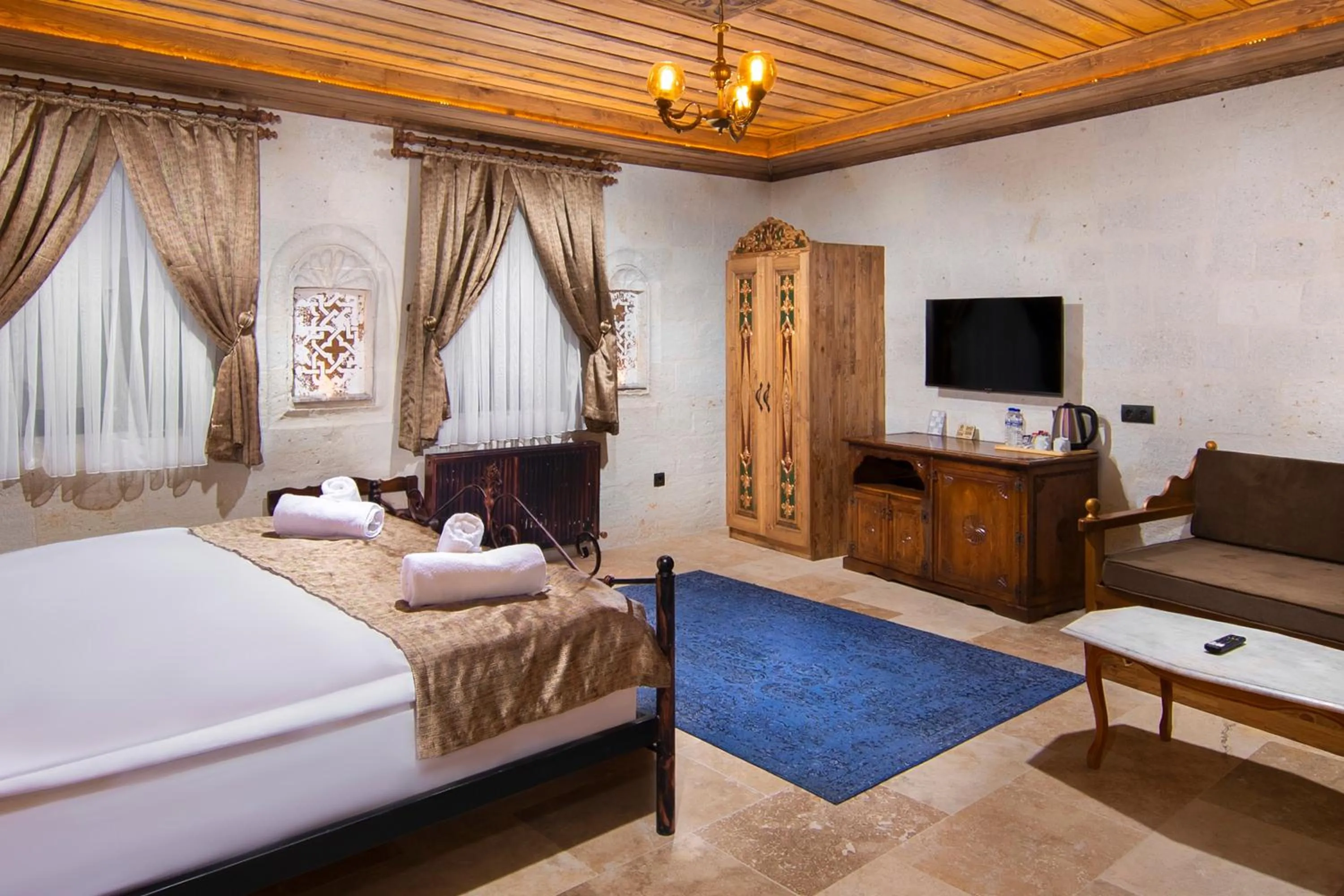 Bed in Dionysos Cave Cappadocia Hotel