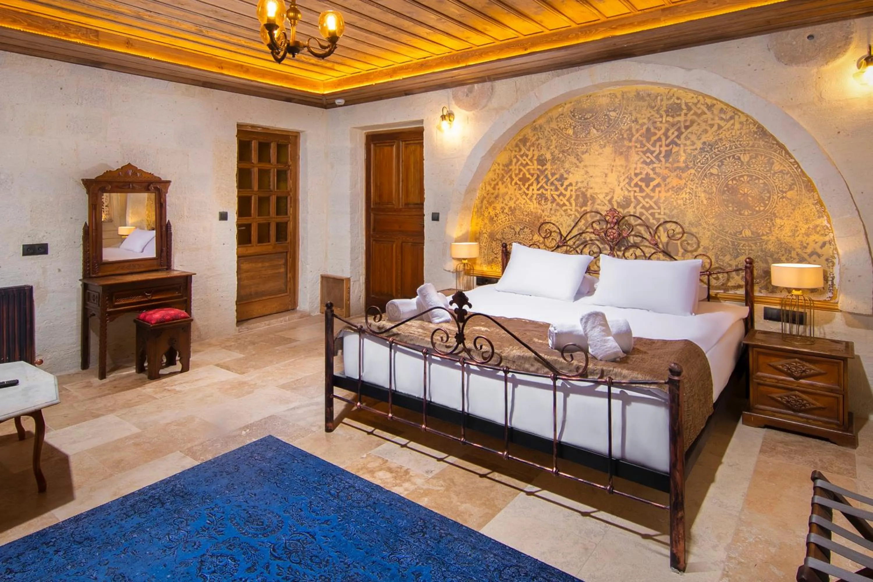 Bed in Dionysos Cave Cappadocia Hotel