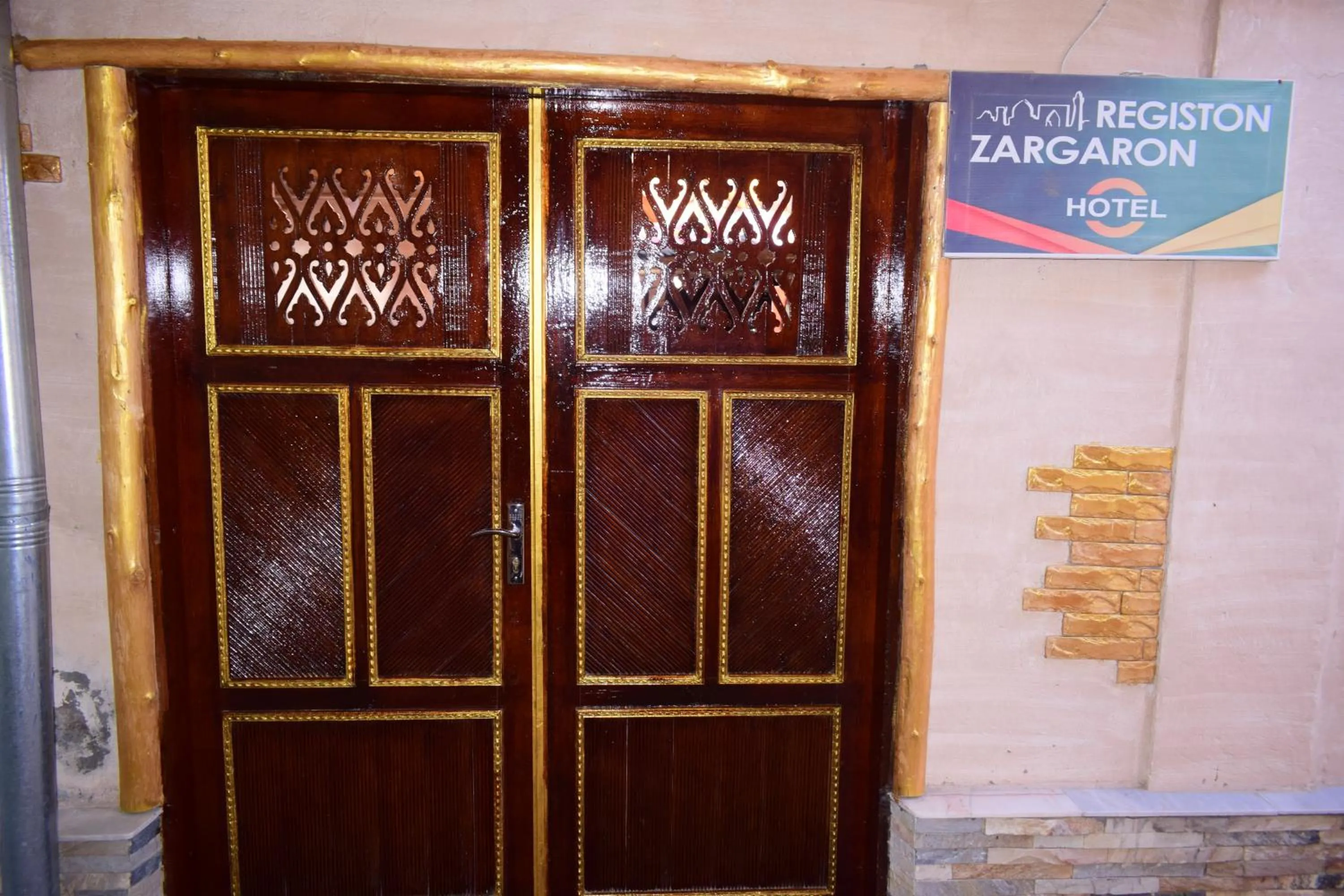 Property logo or sign in Hotel Registon Zargaron