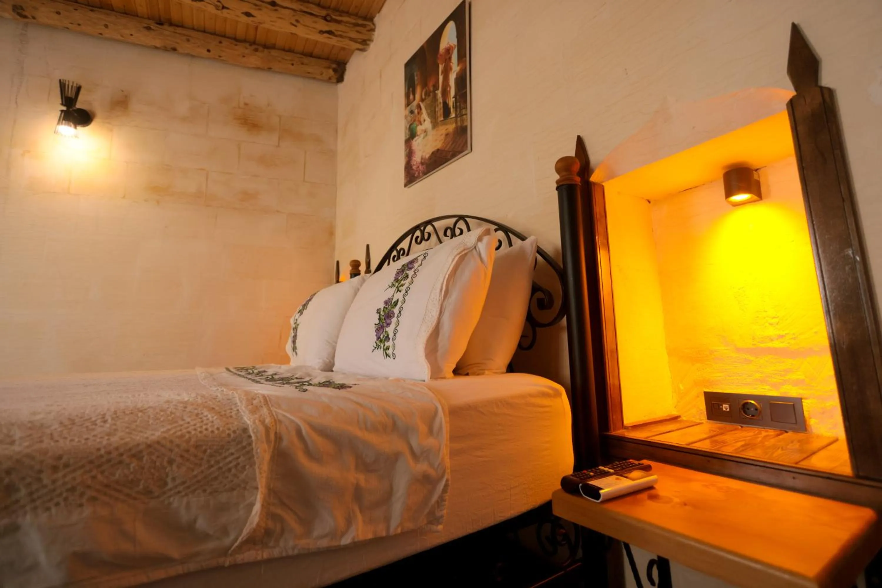 Bed in ASTARTE HOTEL