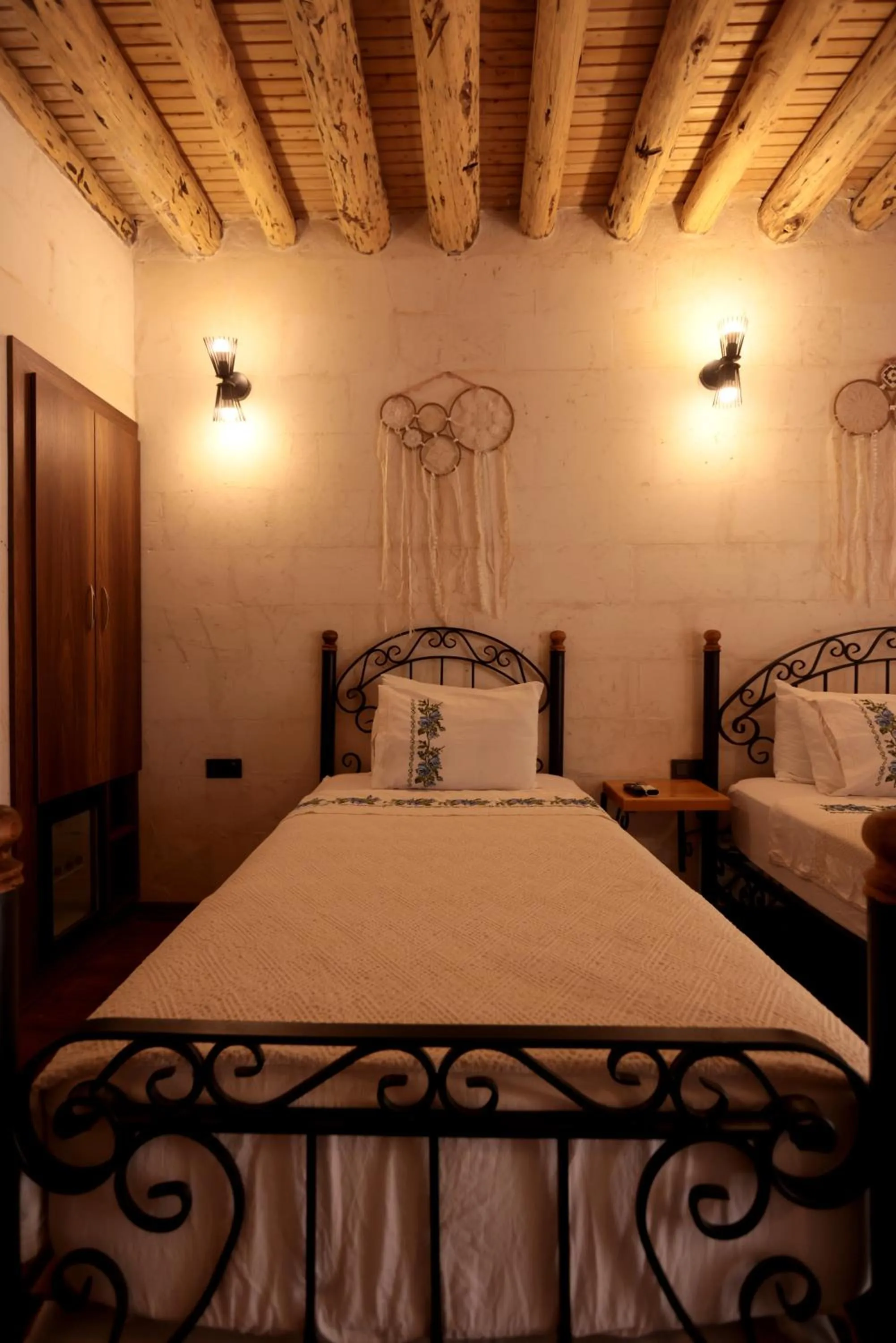 Bed in ASTARTE HOTEL