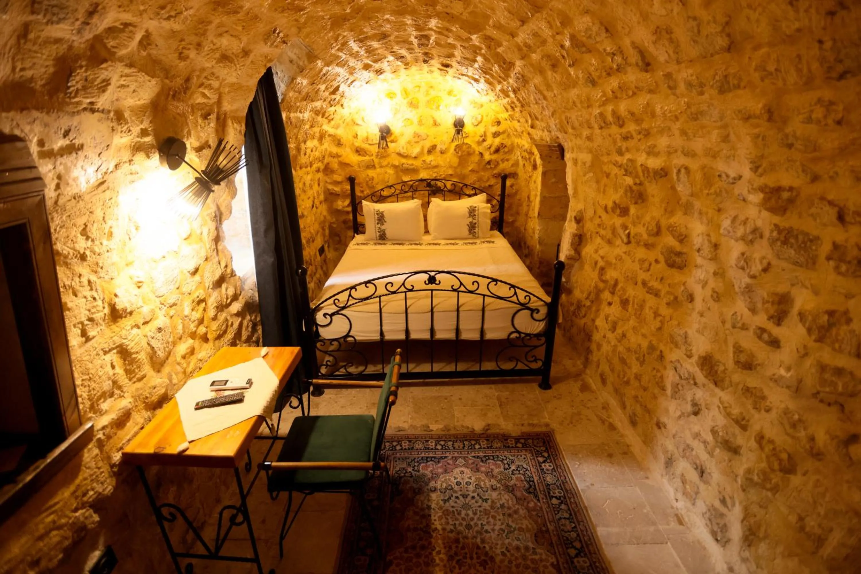 Bed in ASTARTE HOTEL