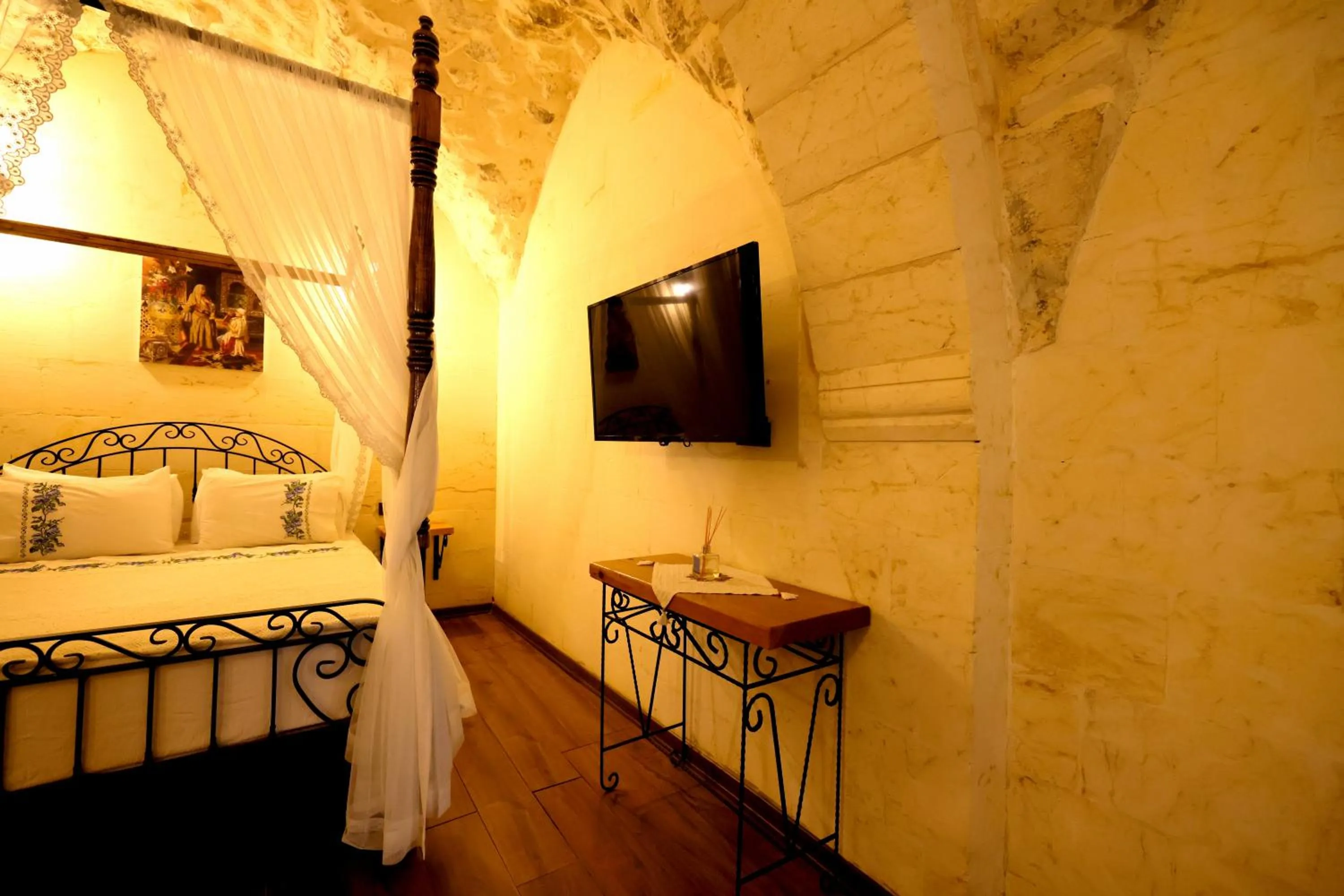 Bed in ASTARTE HOTEL