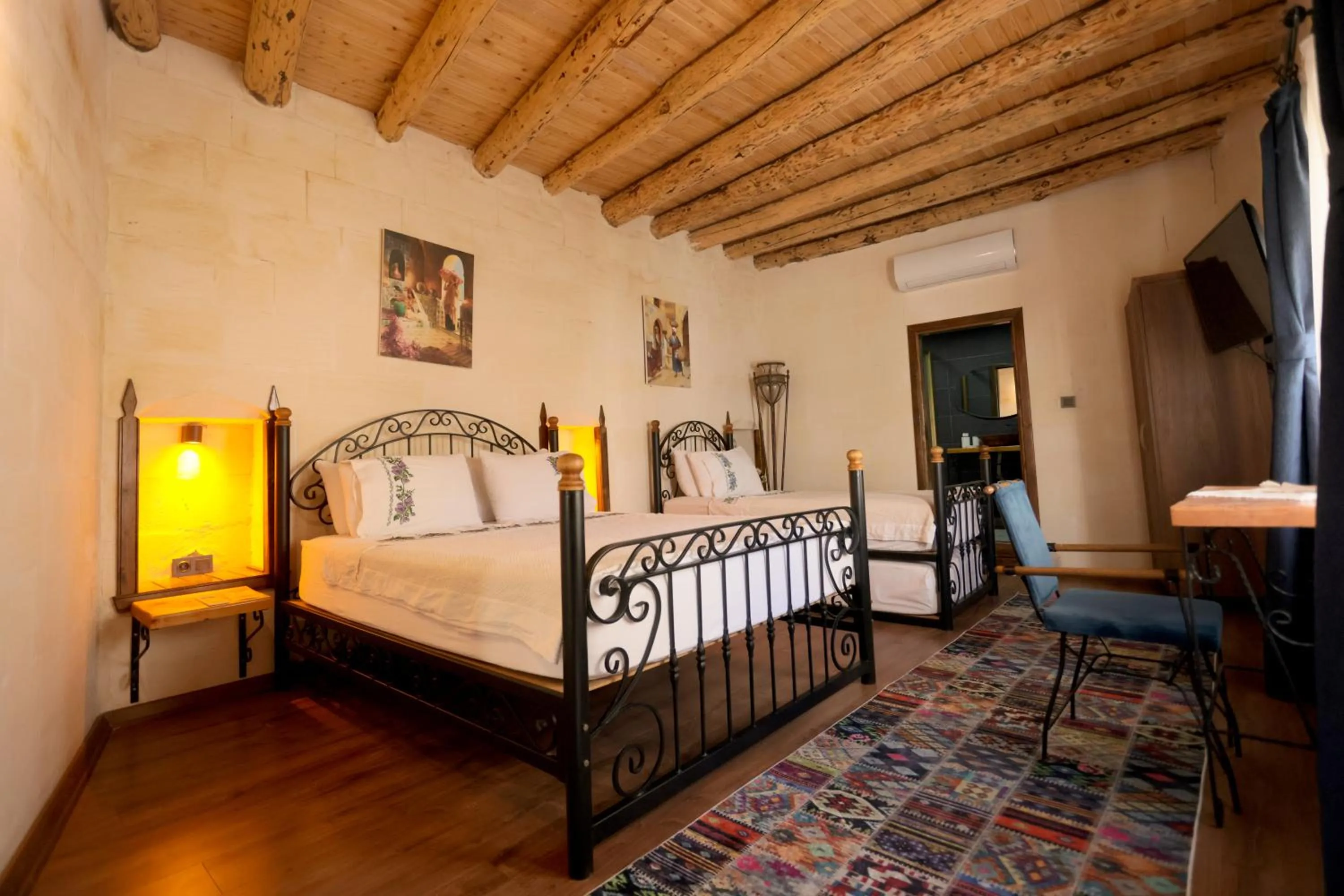 Bed in ASTARTE HOTEL