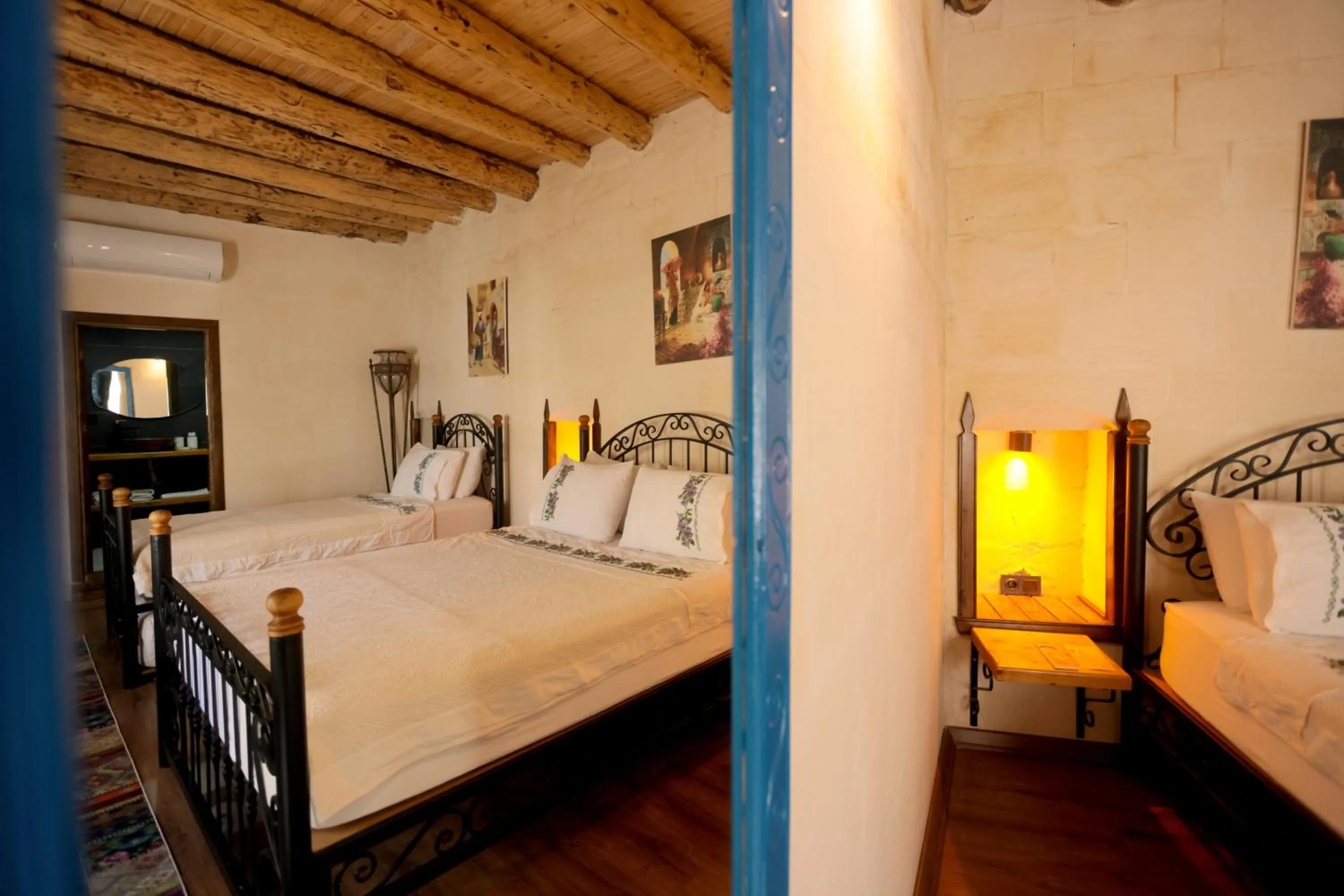 Bed in ASTARTE HOTEL