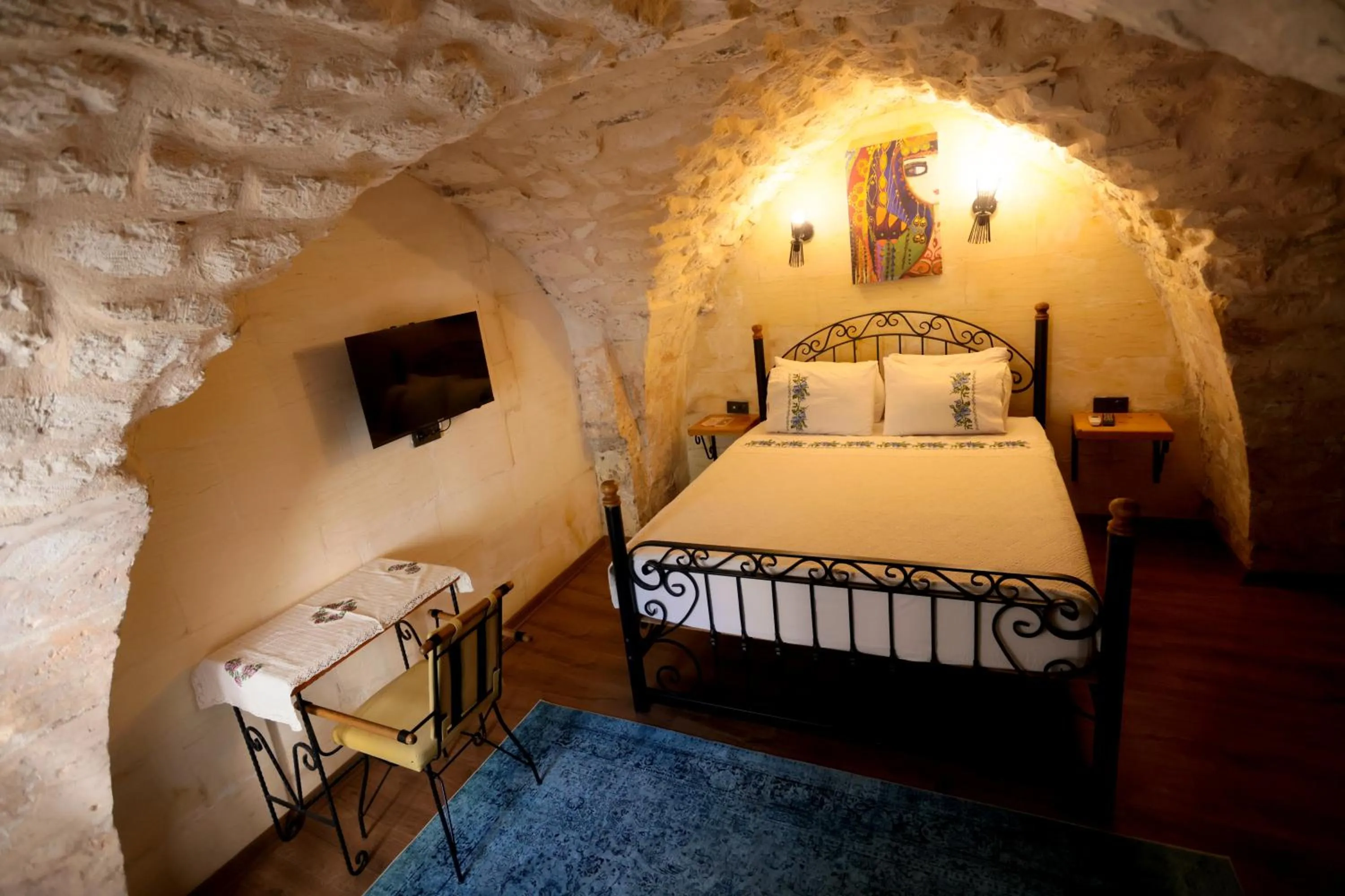 Bed in ASTARTE HOTEL