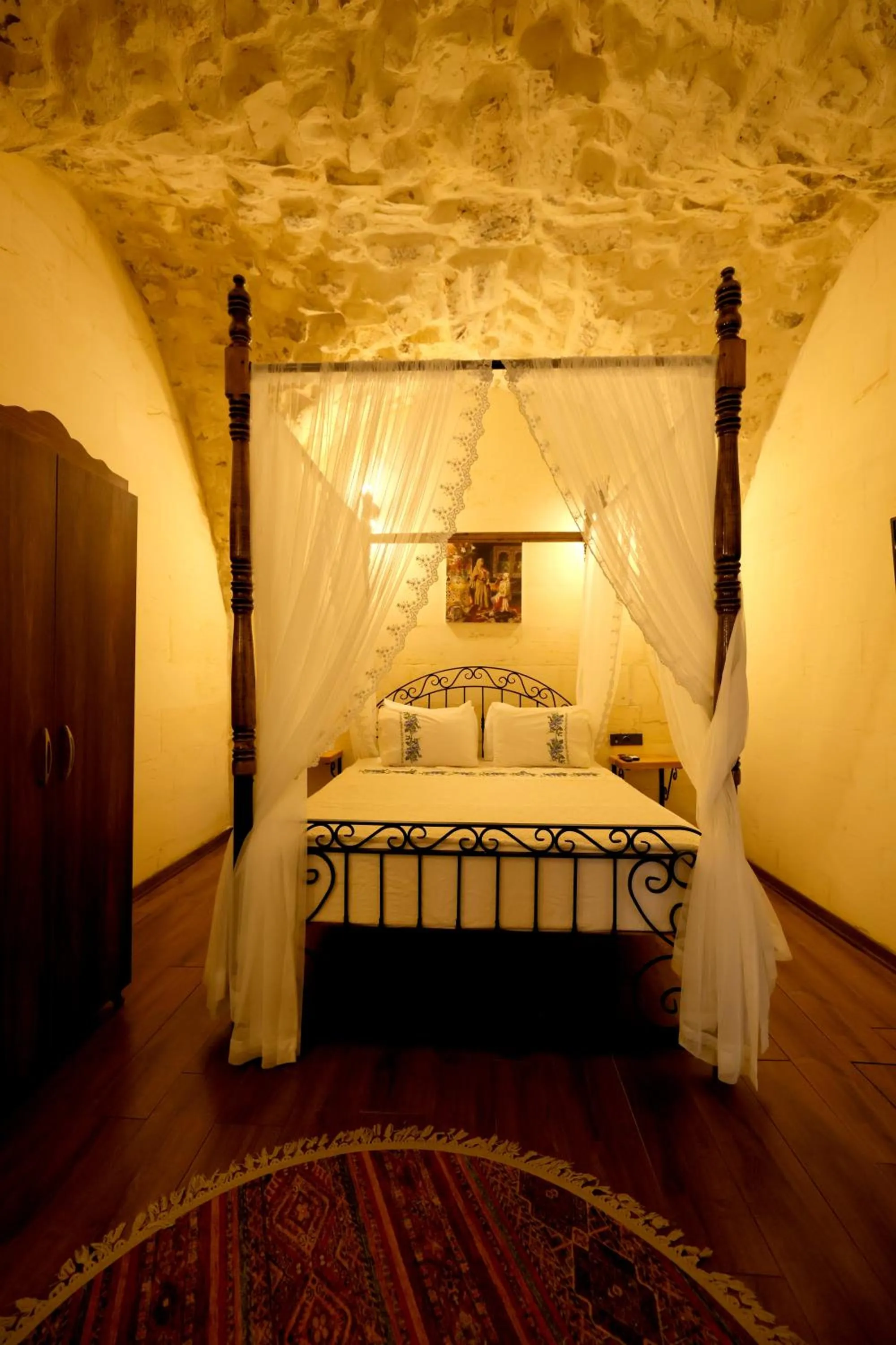 Bed in ASTARTE HOTEL