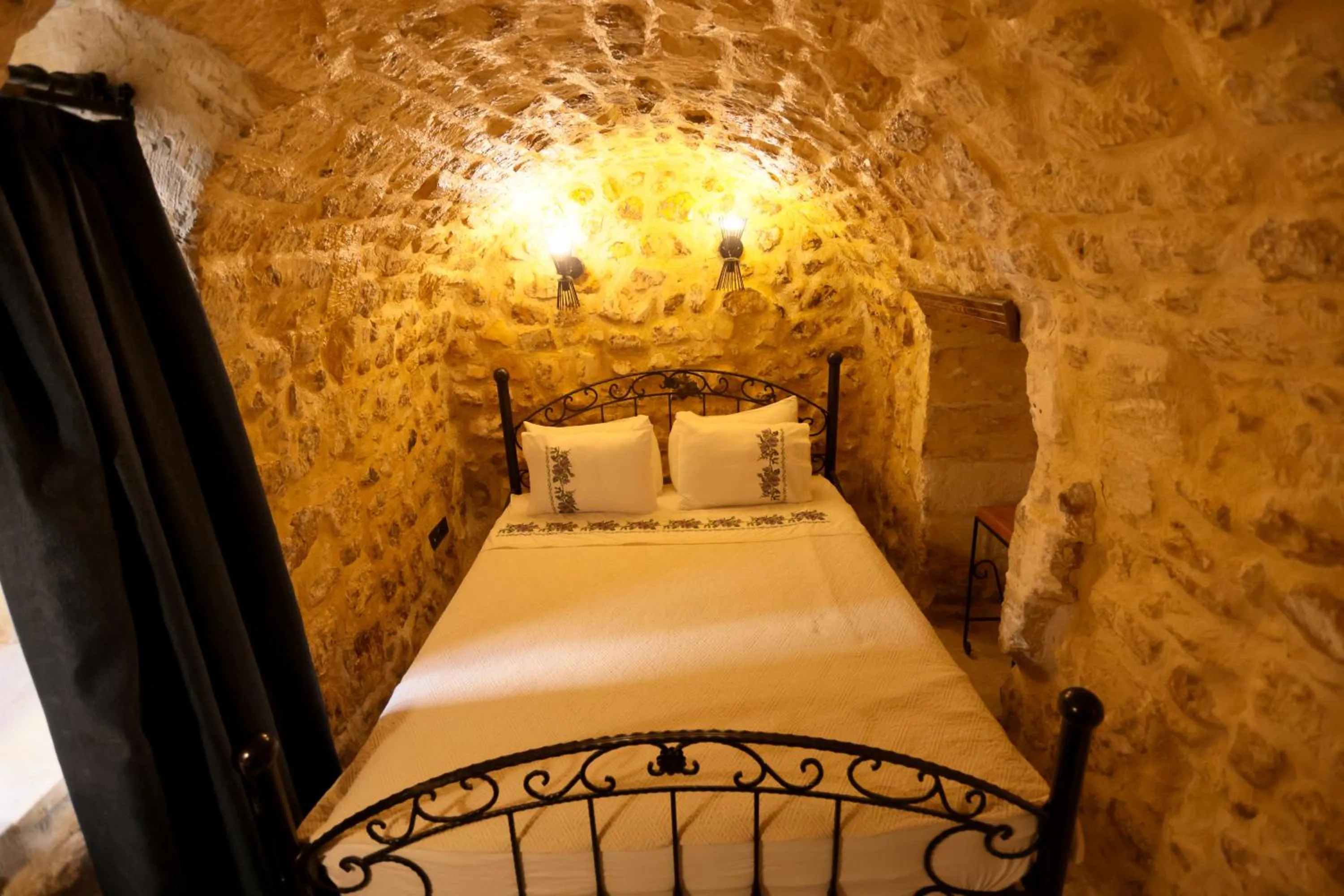 Bed in ASTARTE HOTEL