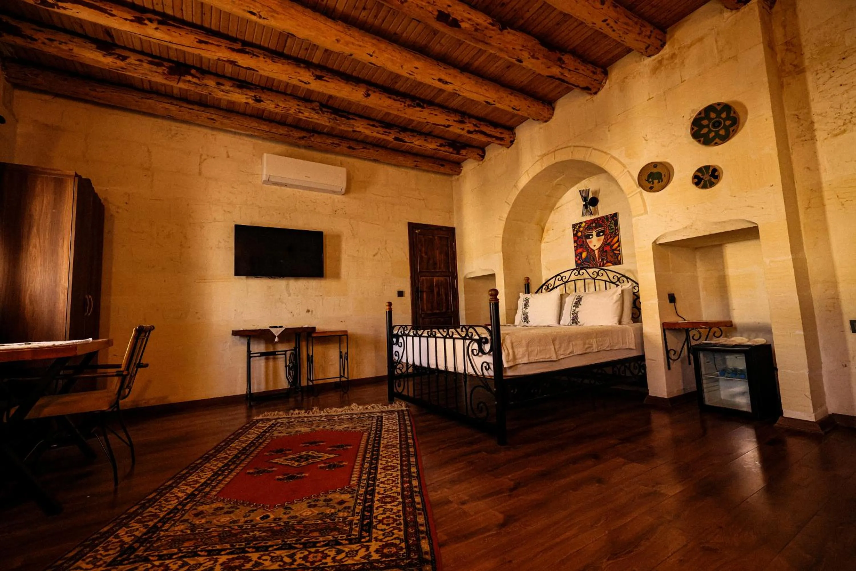 Bed in ASTARTE HOTEL