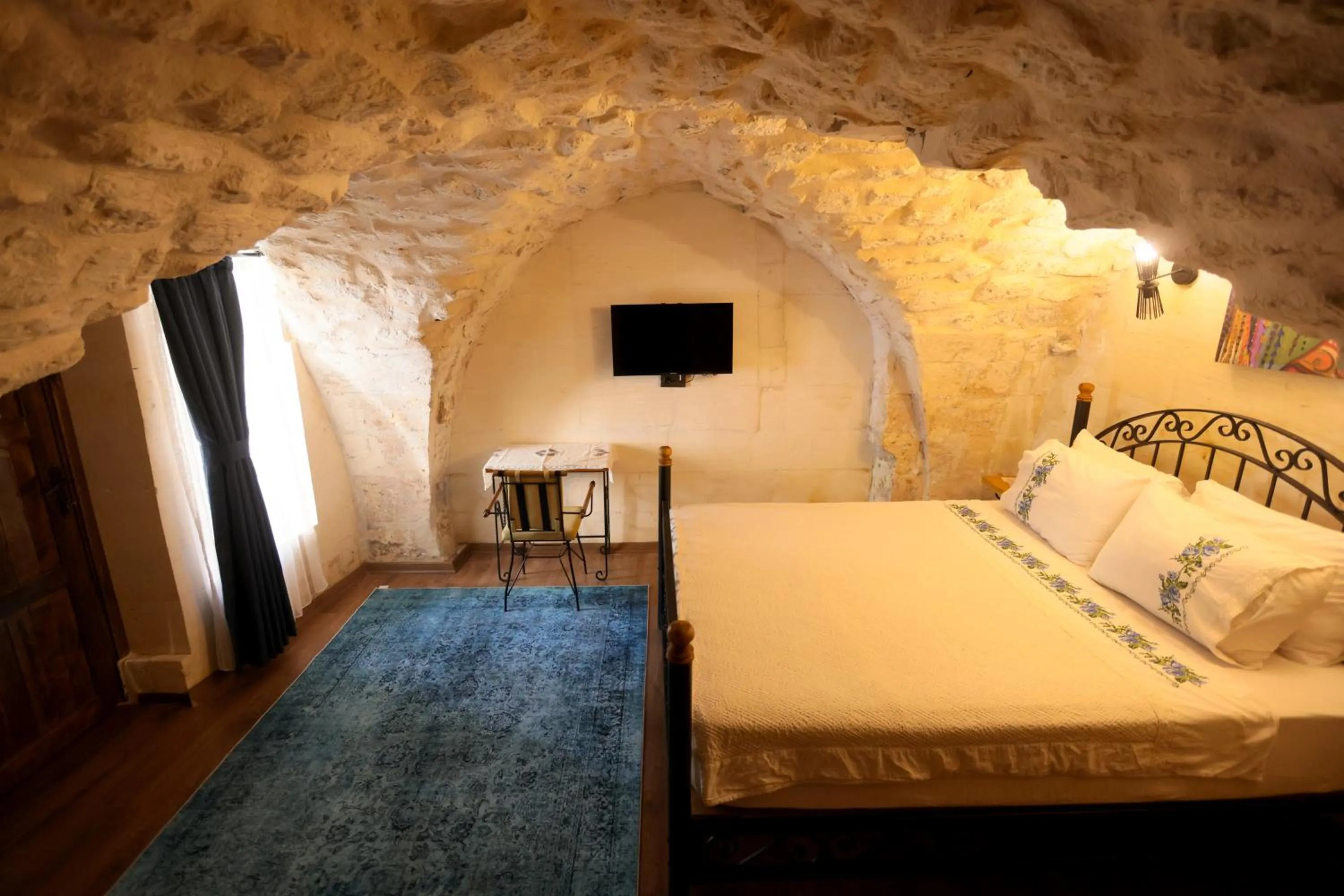 Bed in ASTARTE HOTEL