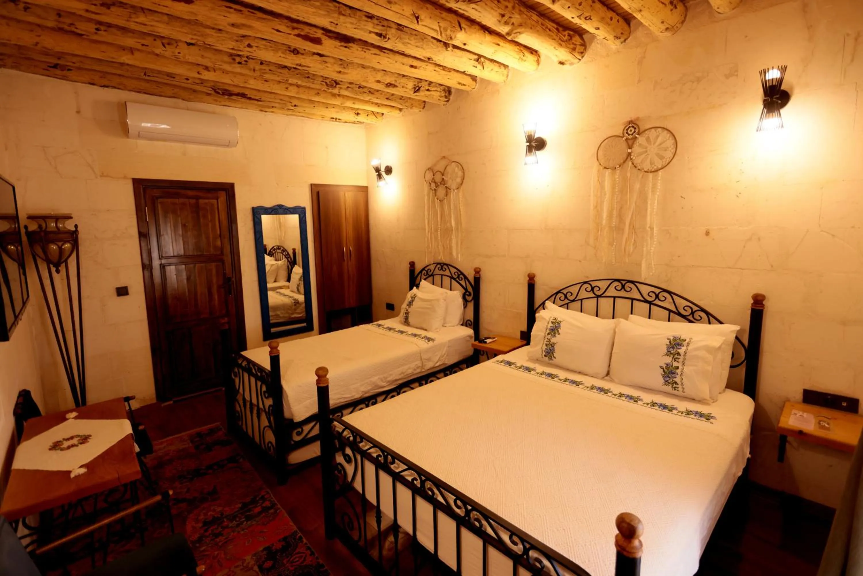 Bed in ASTARTE HOTEL