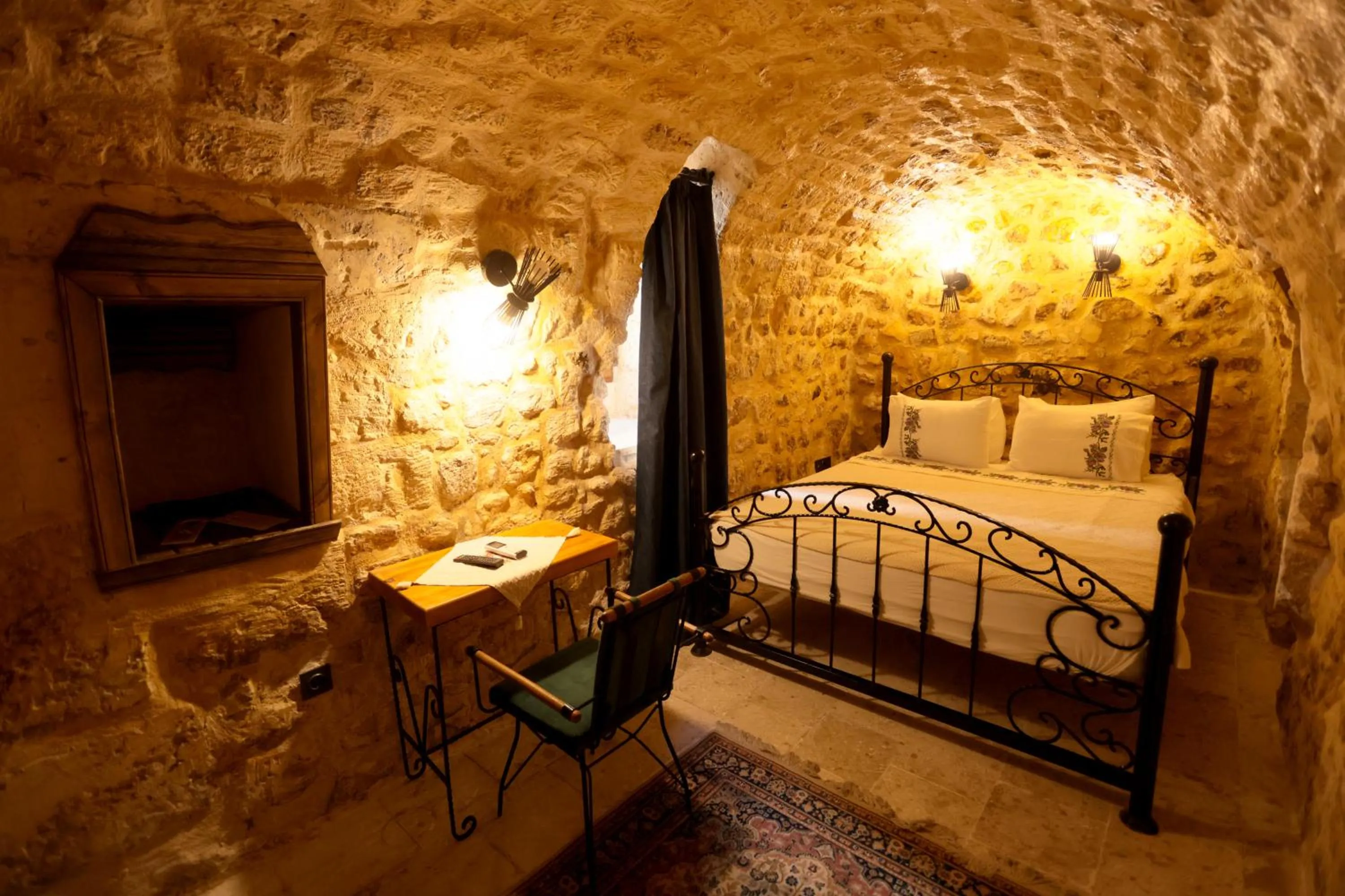 Bed in ASTARTE HOTEL