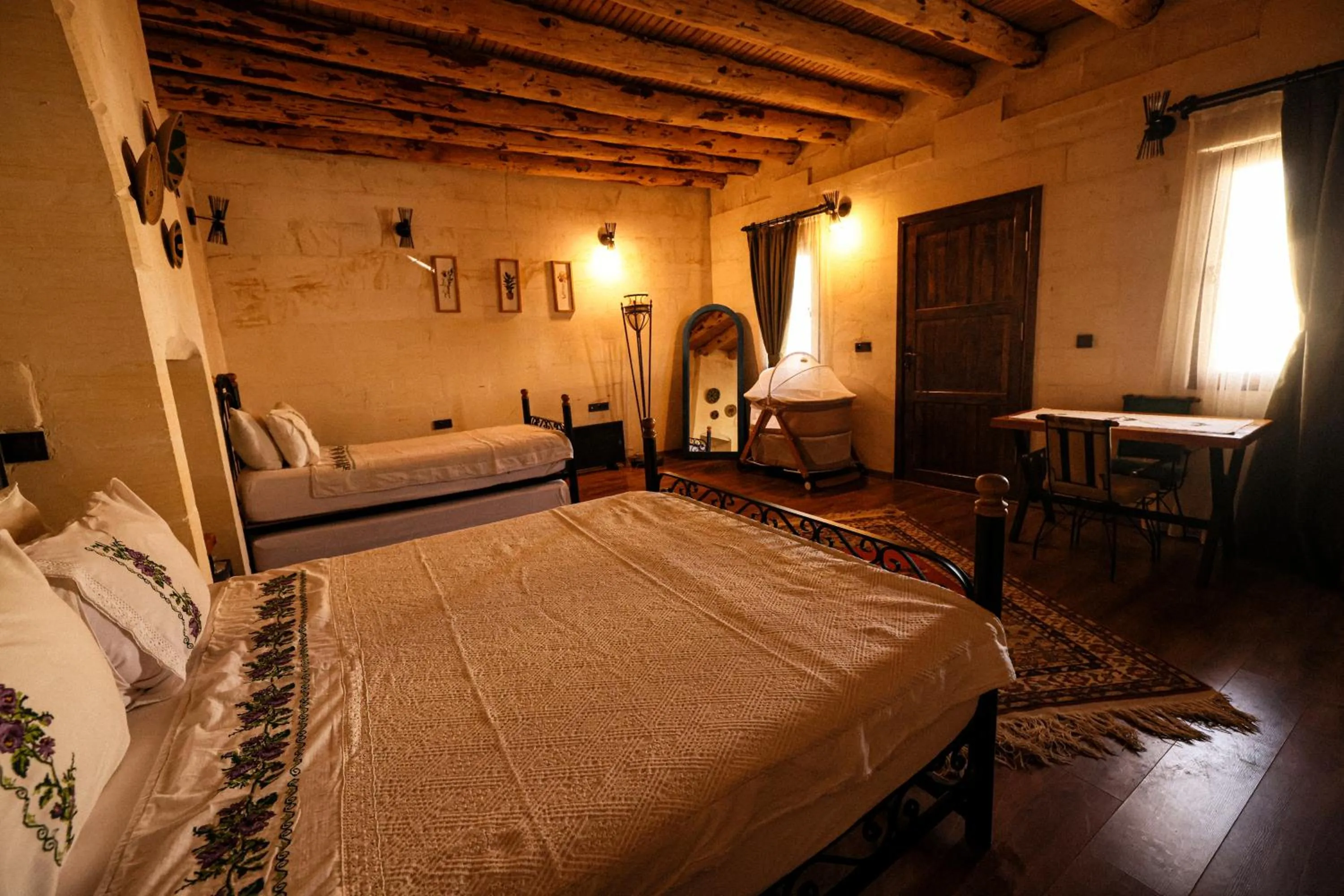 Bed in ASTARTE HOTEL