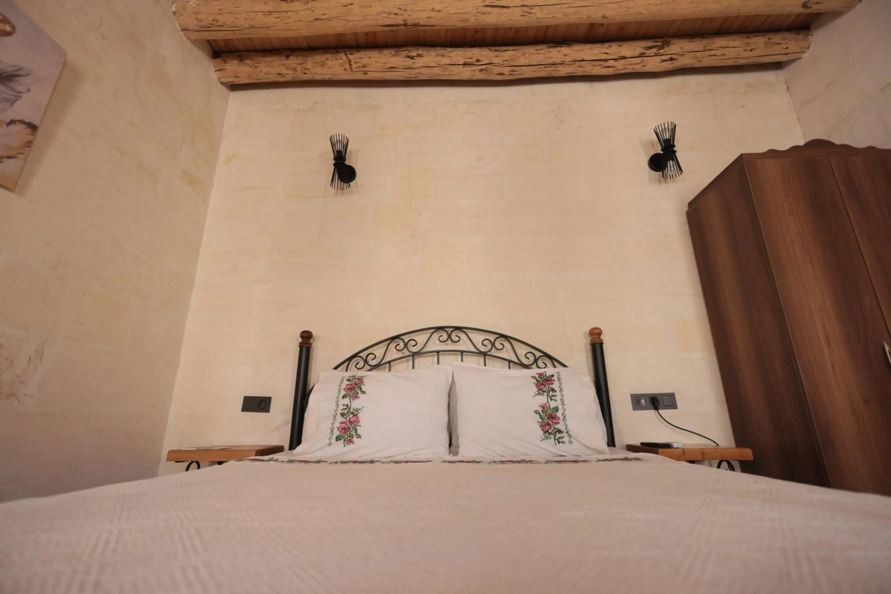 Bed in ASTARTE HOTEL