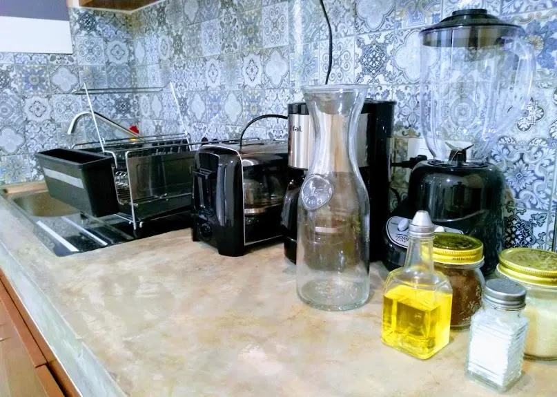 Coffee/tea facilities in Cozy and spacious apartment by Tulum 10