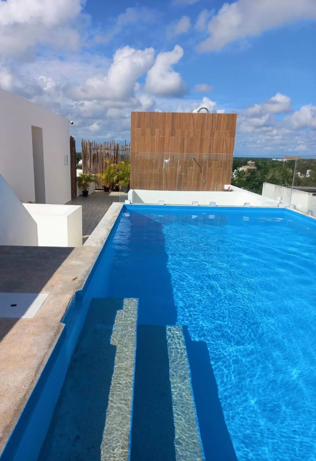 Swimming pool in Cozy and spacious apartment by Tulum 10