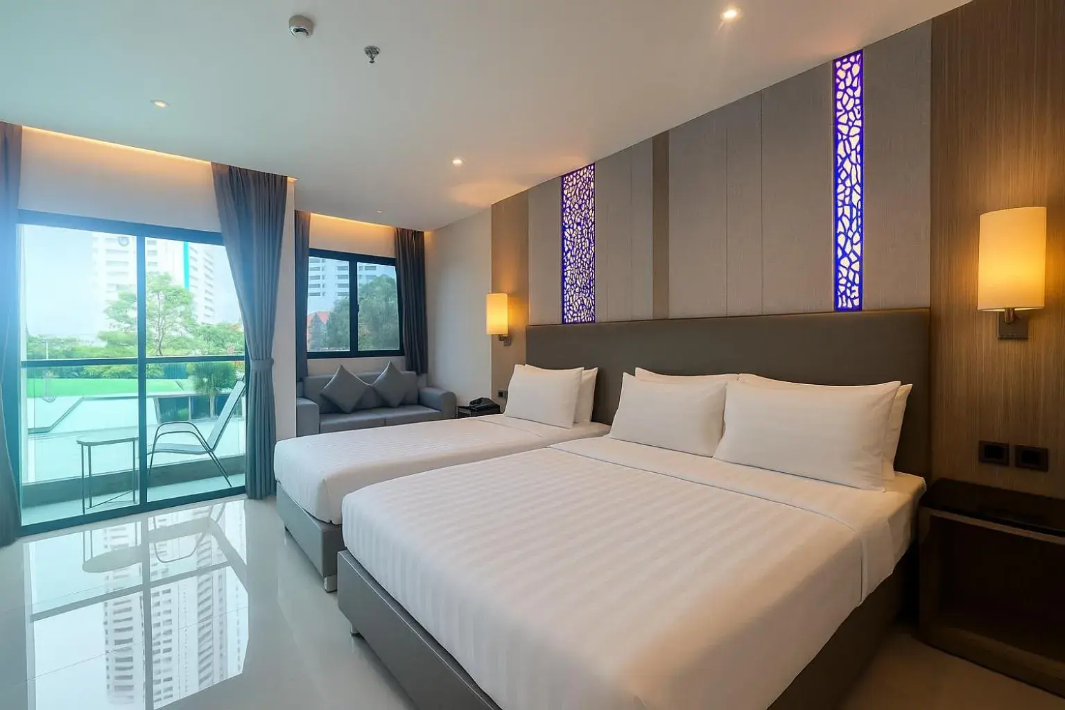 Deluxe Triple Room with Balcony in THE TJ HOTEL Pattaya Deluxe Triple Room with Balcony in THE TJ HOTEL Pattaya