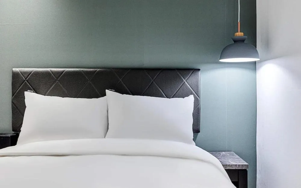 Bed in Hotel WO Yongsan Station