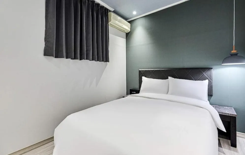 Bed in Hotel WO Yongsan Station