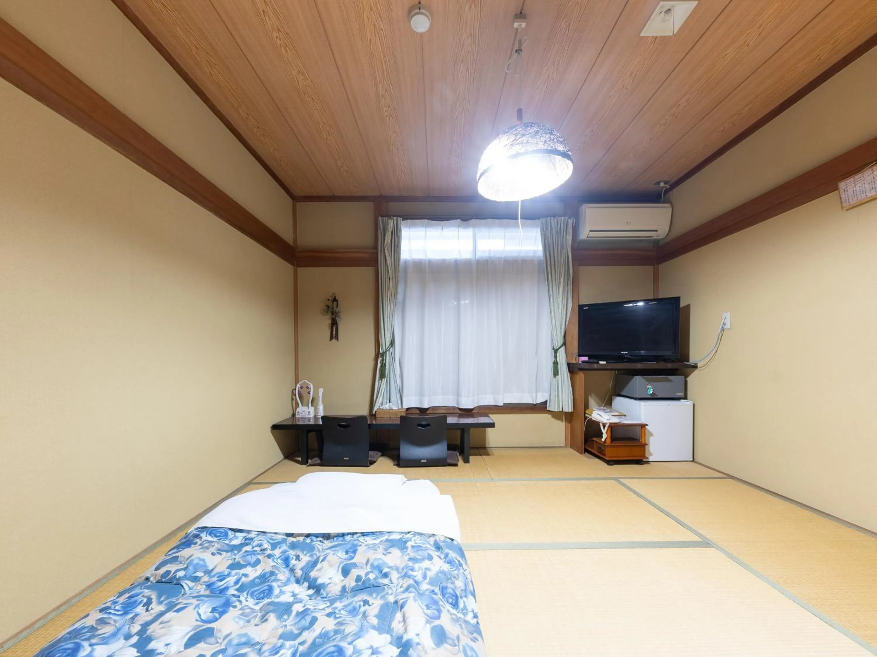 Bed in Tabist Hotel Iyashi no Sato