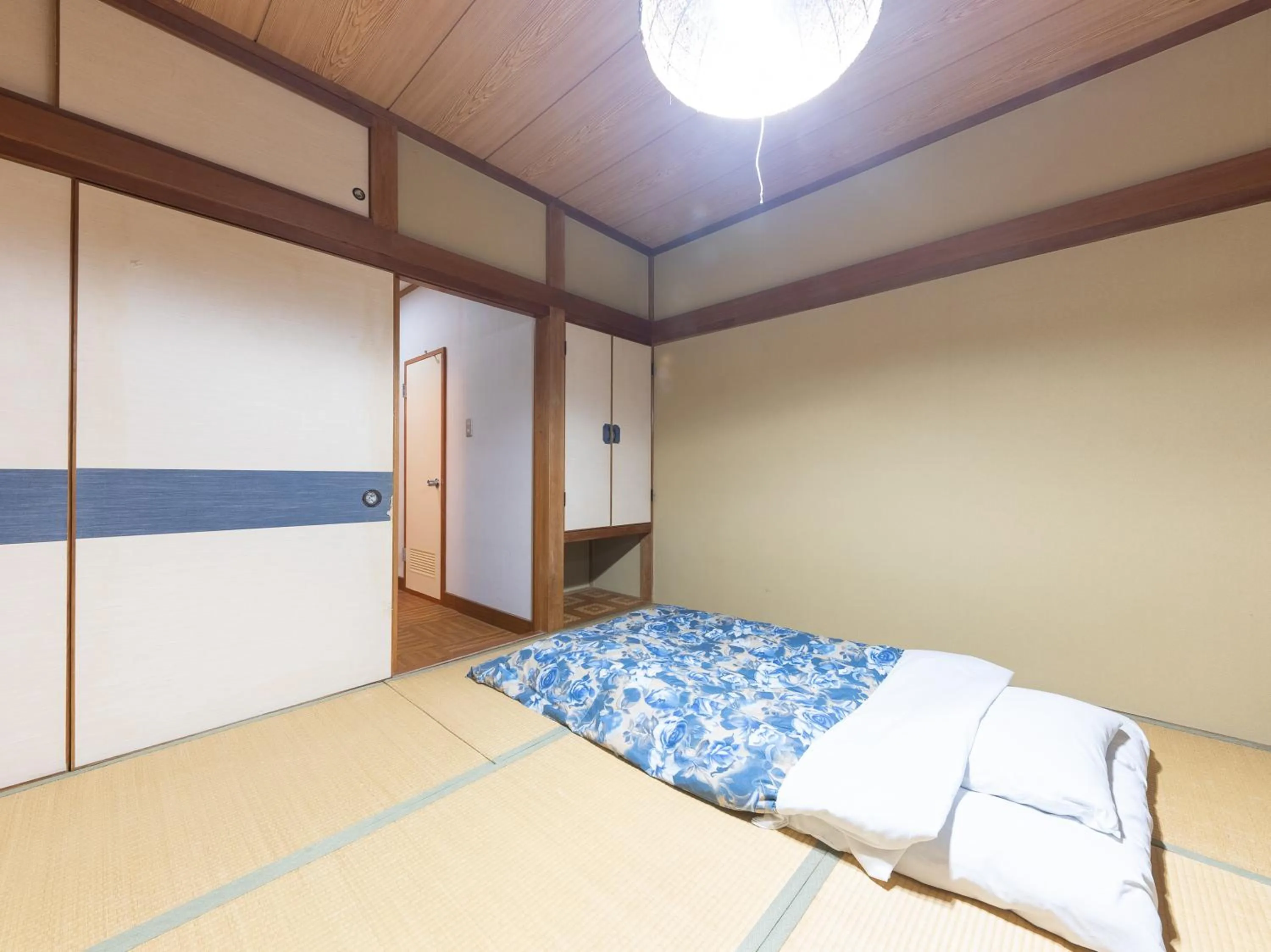 Bed in Tabist Hotel Iyashi no Sato