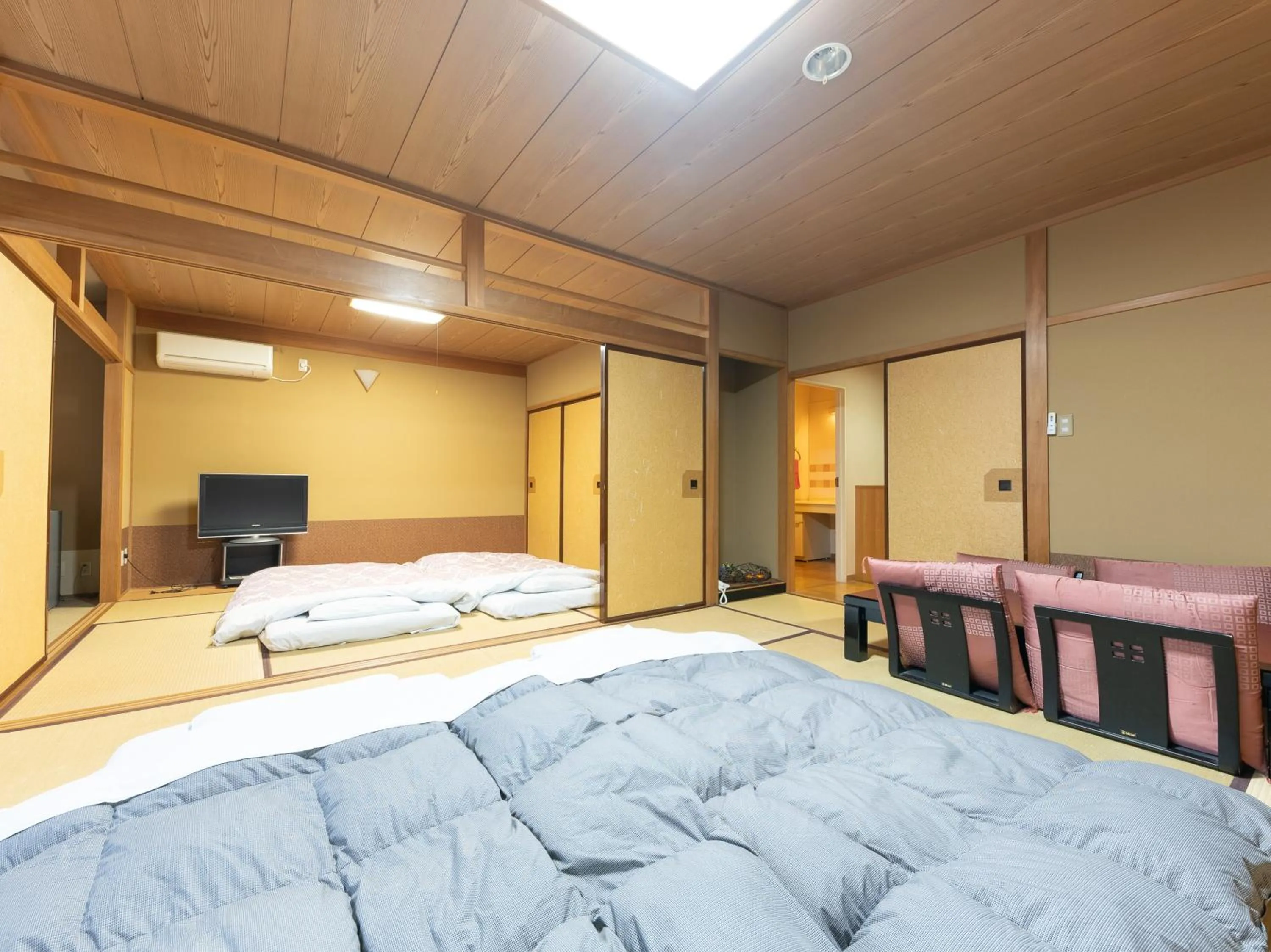 Bed in Tabist Hotel Iyashi no Sato