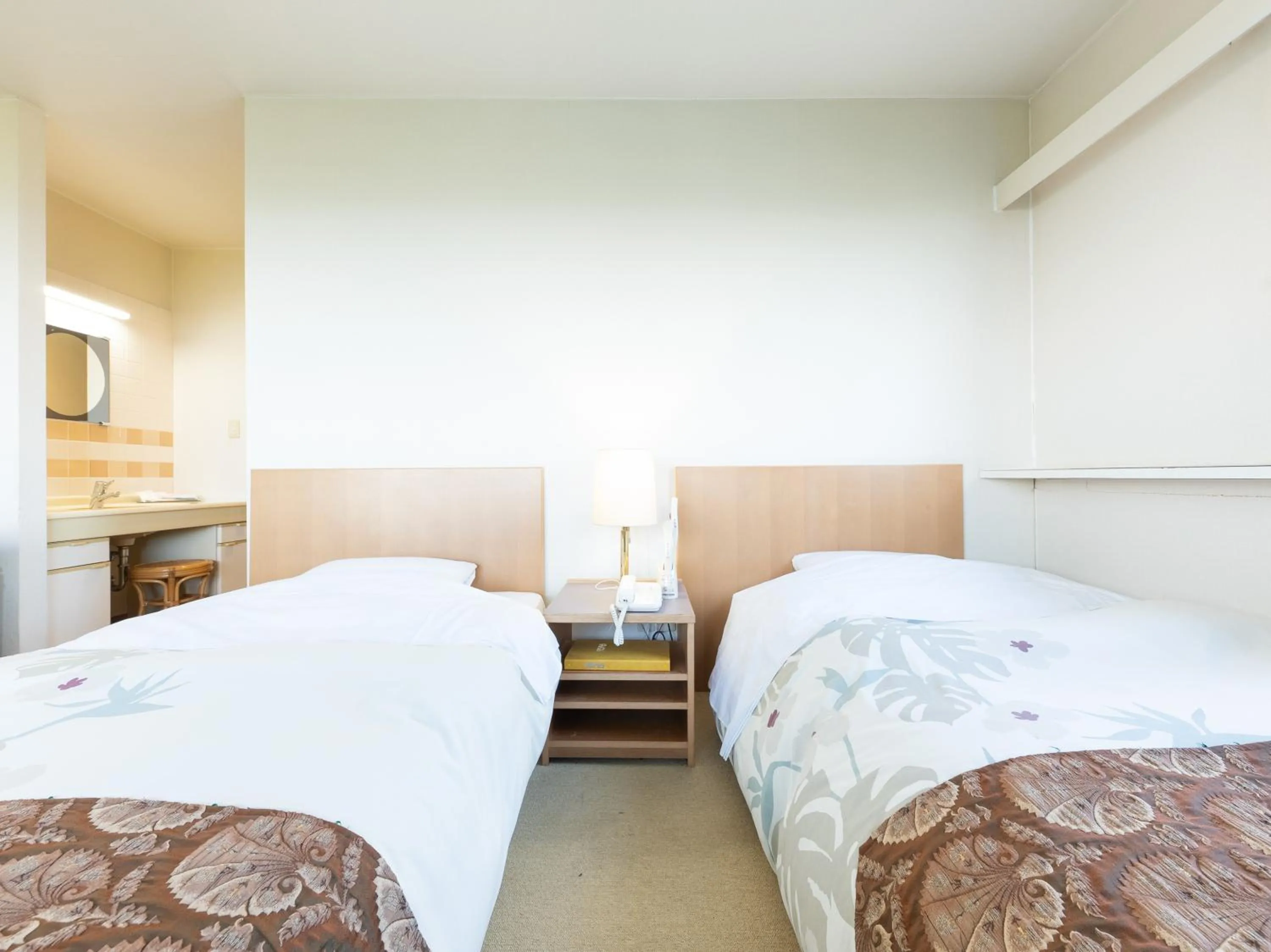 Bed in Tabist Hotel Iyashi no Sato