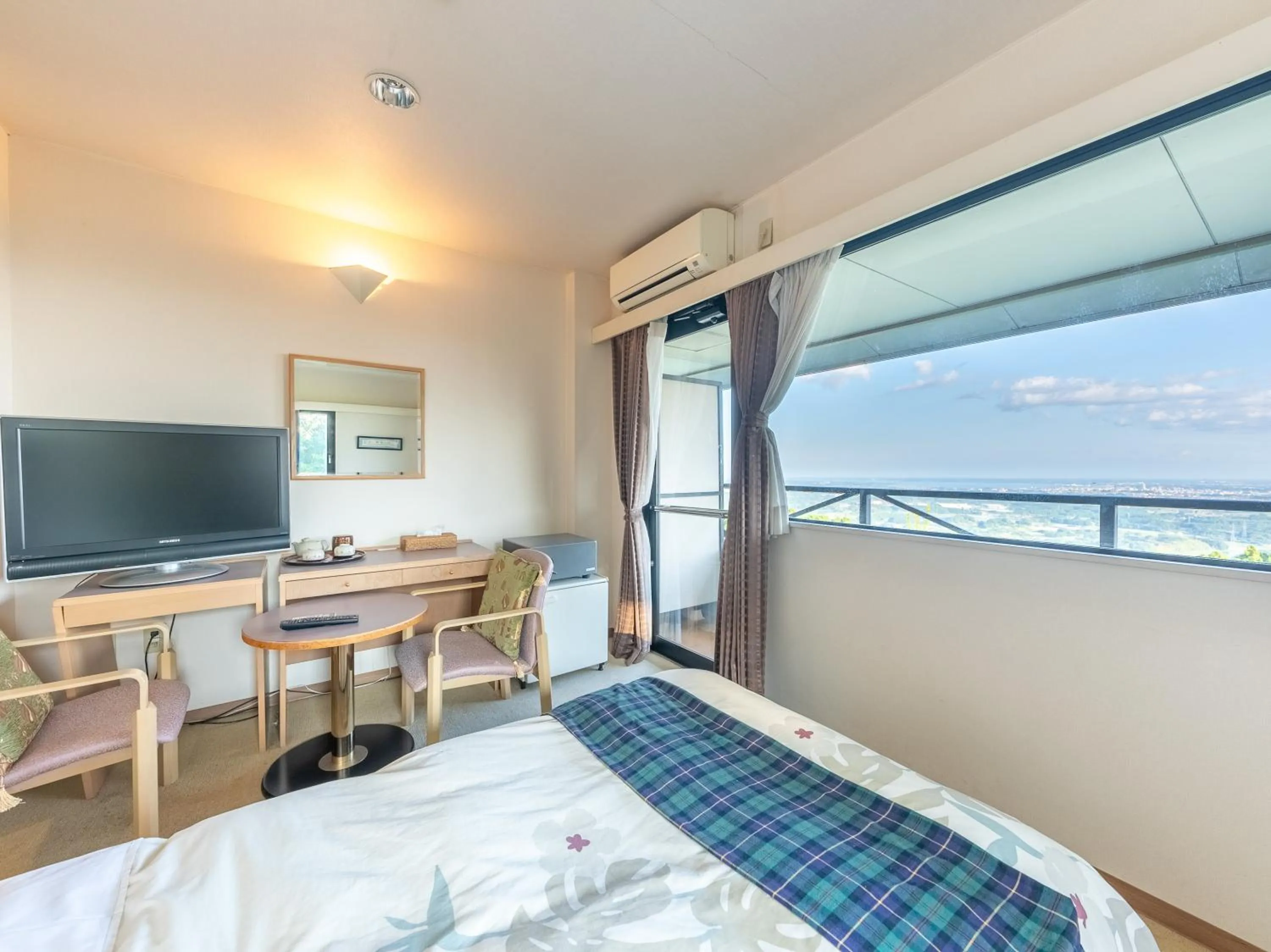 Bed in Tabist Hotel Iyashi no Sato