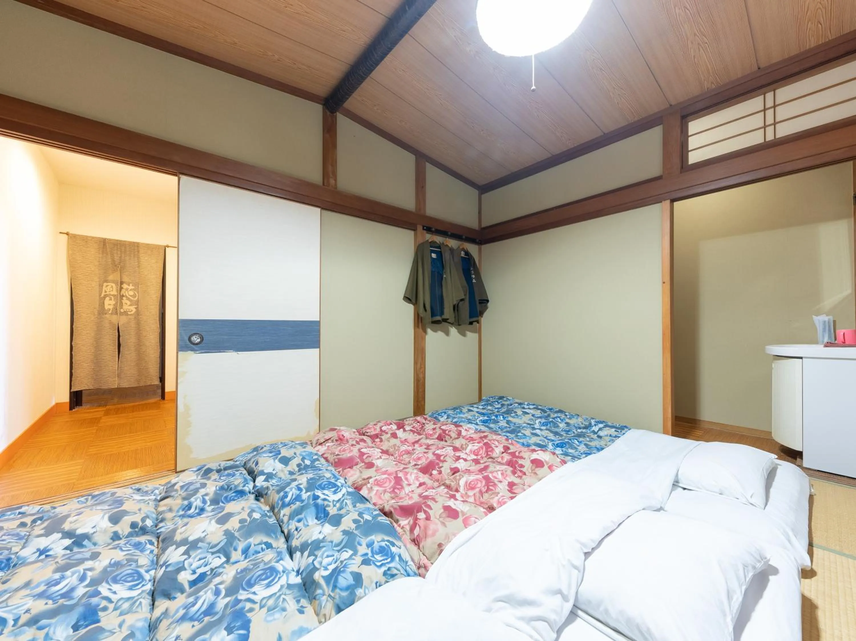 Bed in Tabist Hotel Iyashi no Sato