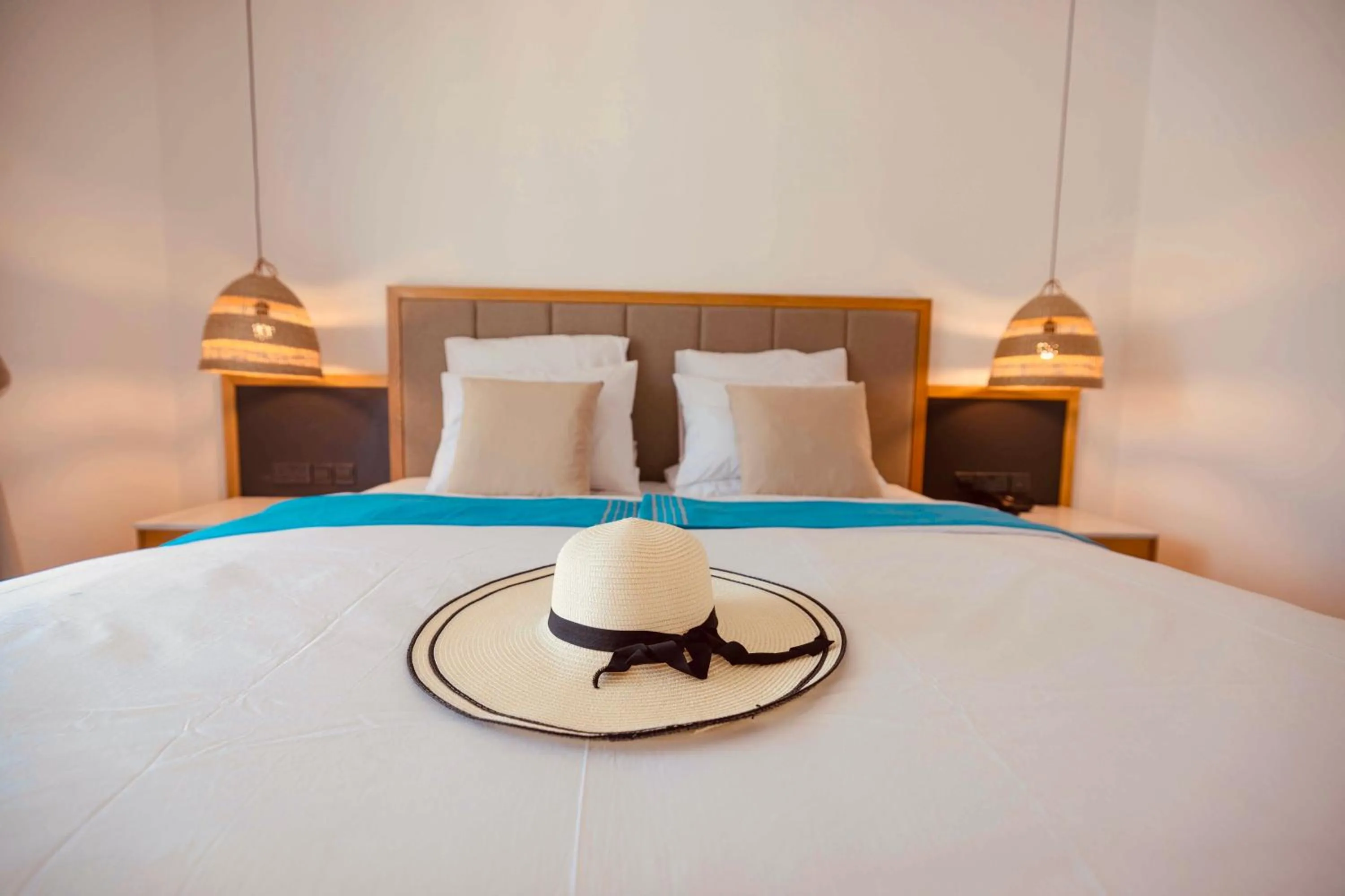 Bed in Palmonte Suites Hotel & SPA