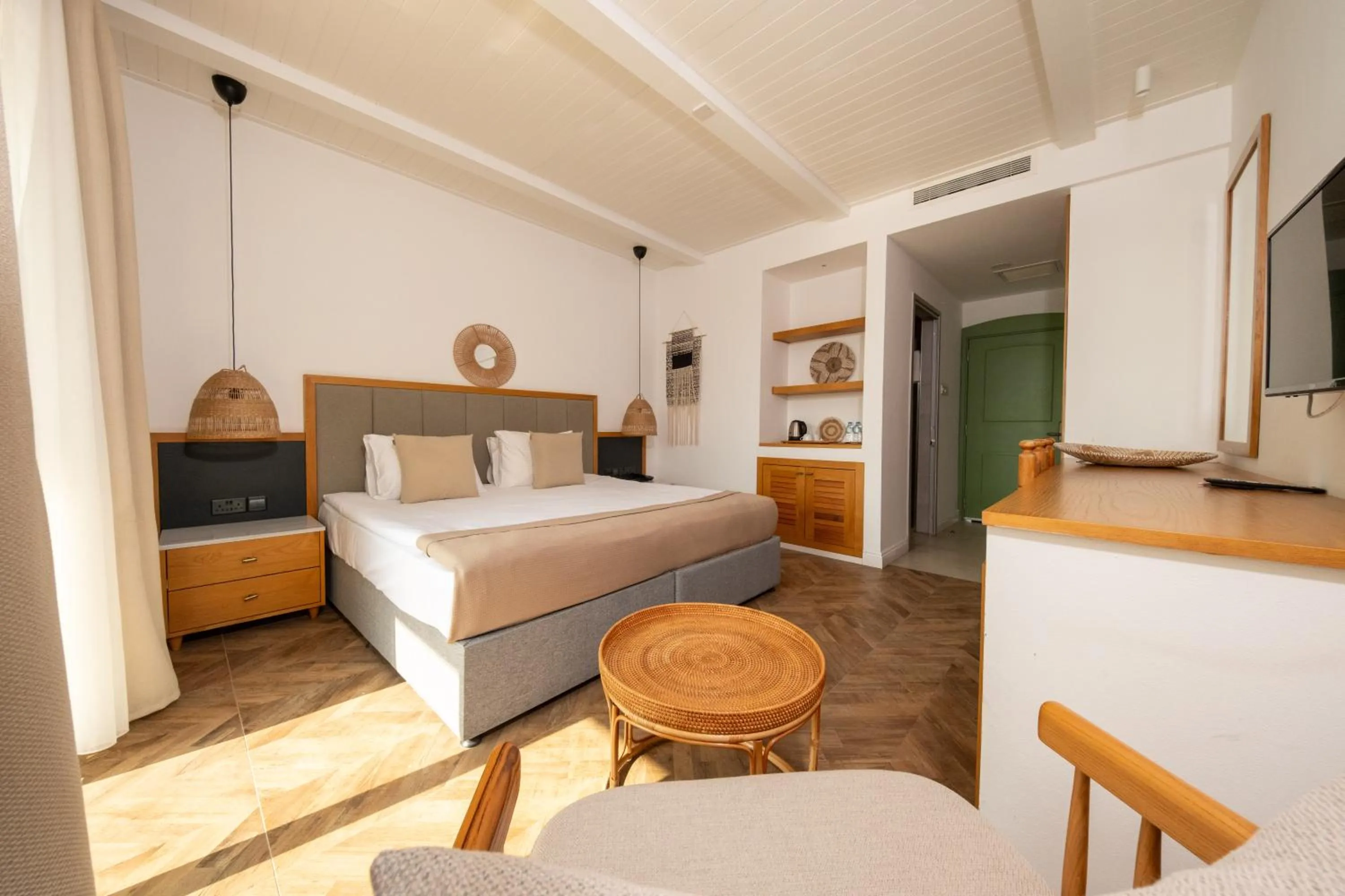 Bed in Palmonte Suites Hotel & SPA