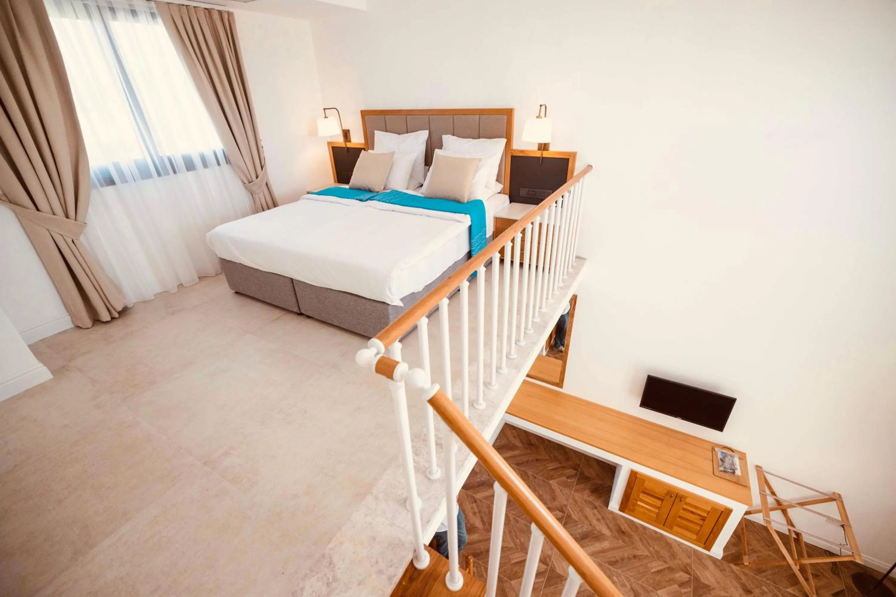 Bed in Palmonte Suites Hotel & SPA