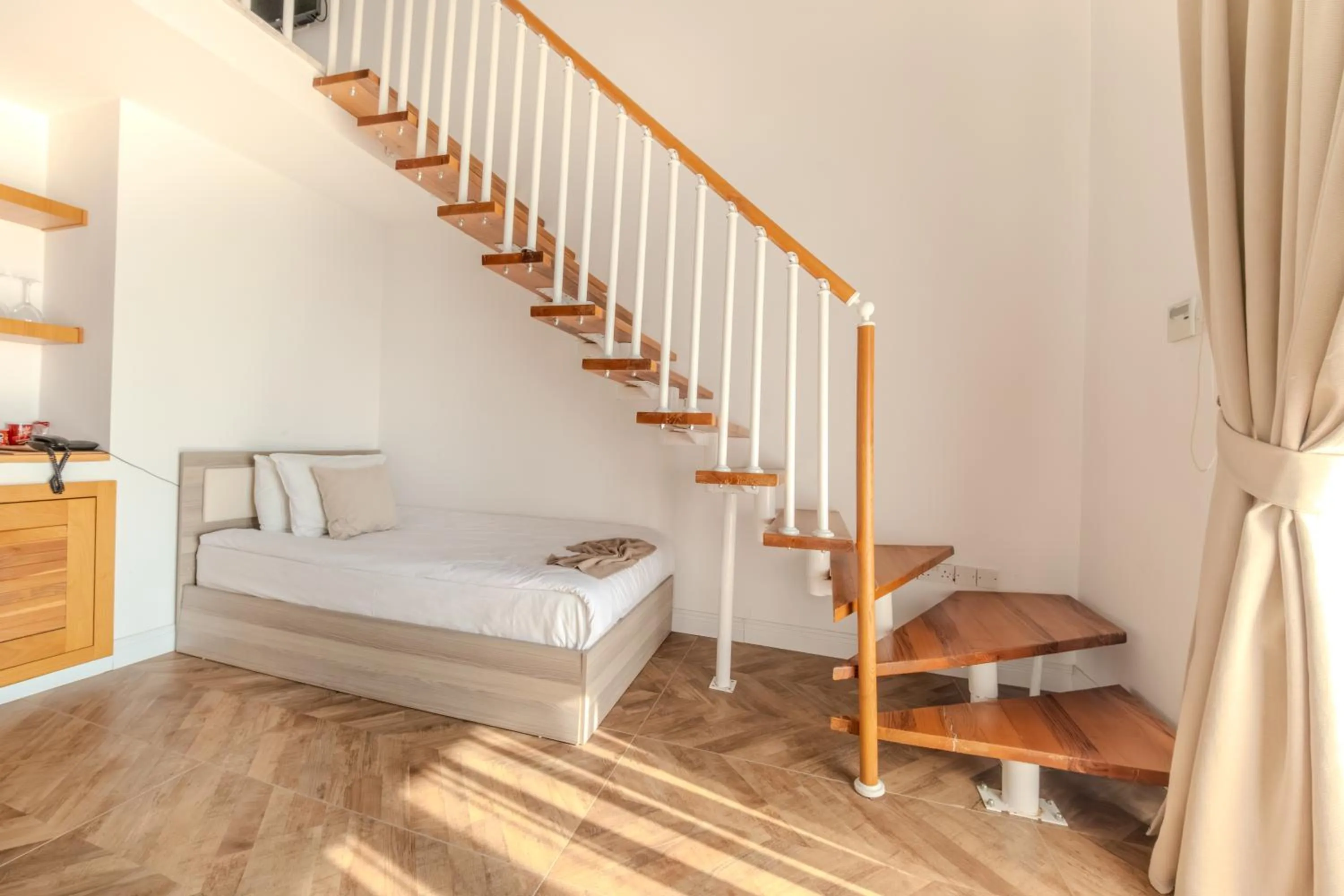 Bed in Palmonte Suites Hotel & SPA