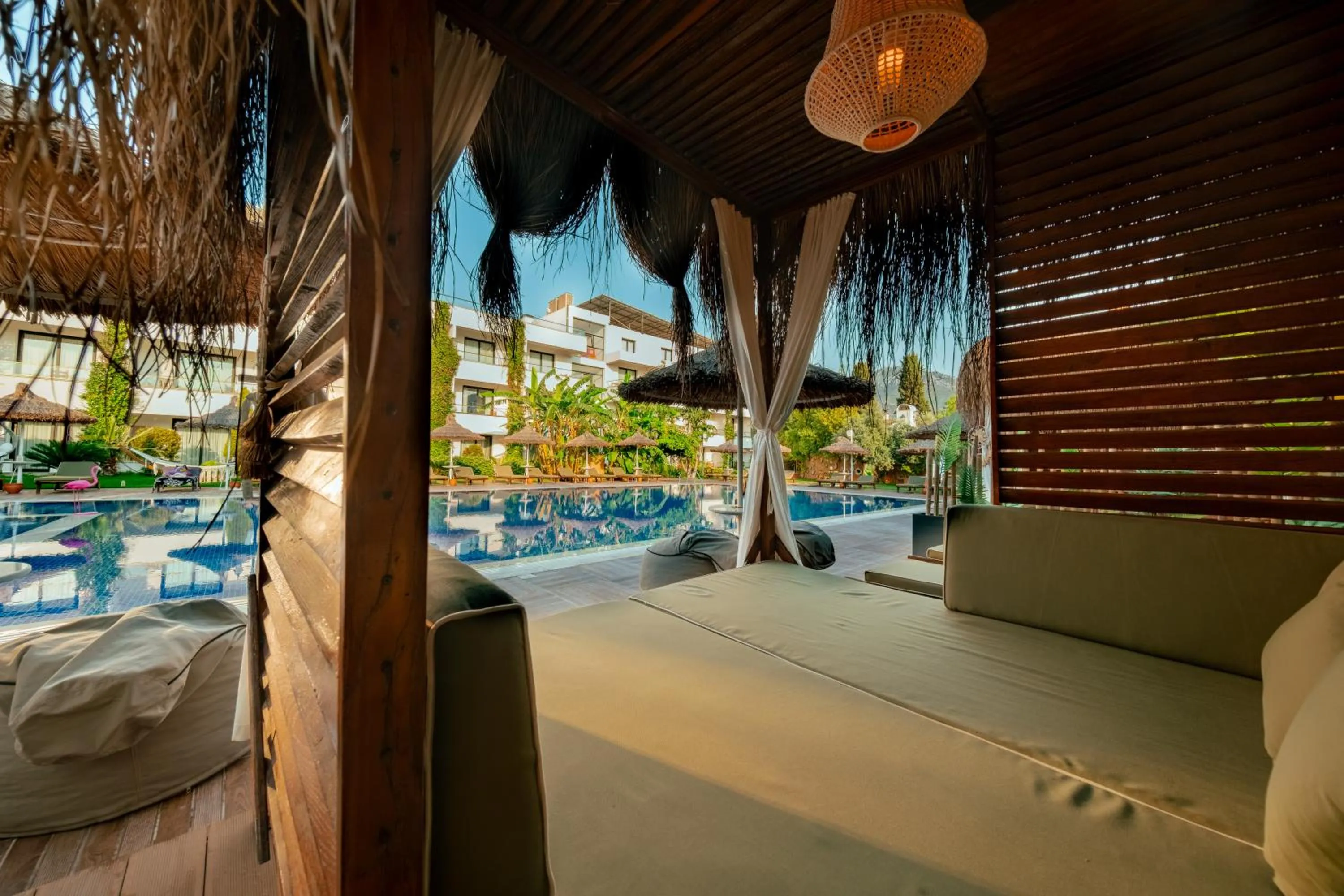 Bed in Palmonte Suites Hotel & SPA