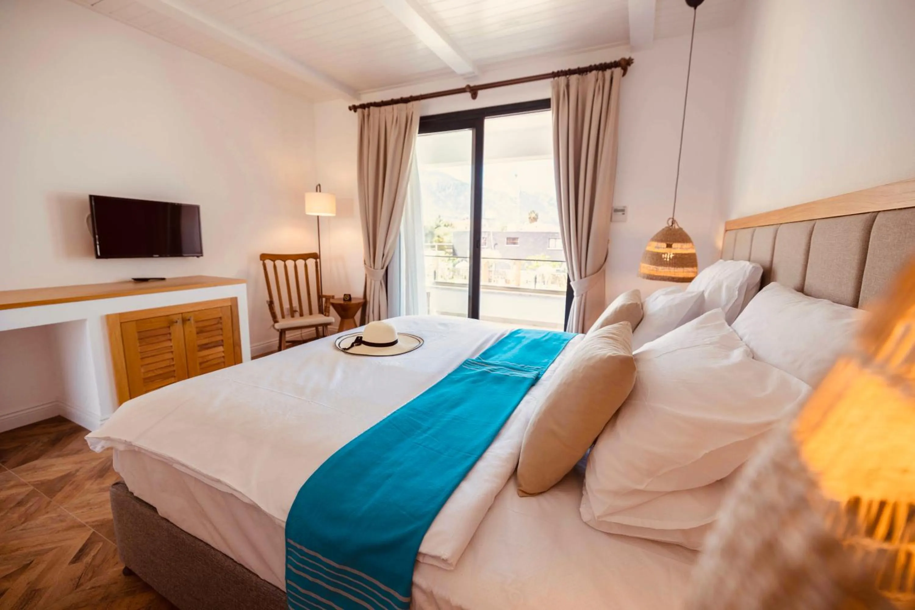 Bed in Palmonte Suites Hotel & SPA