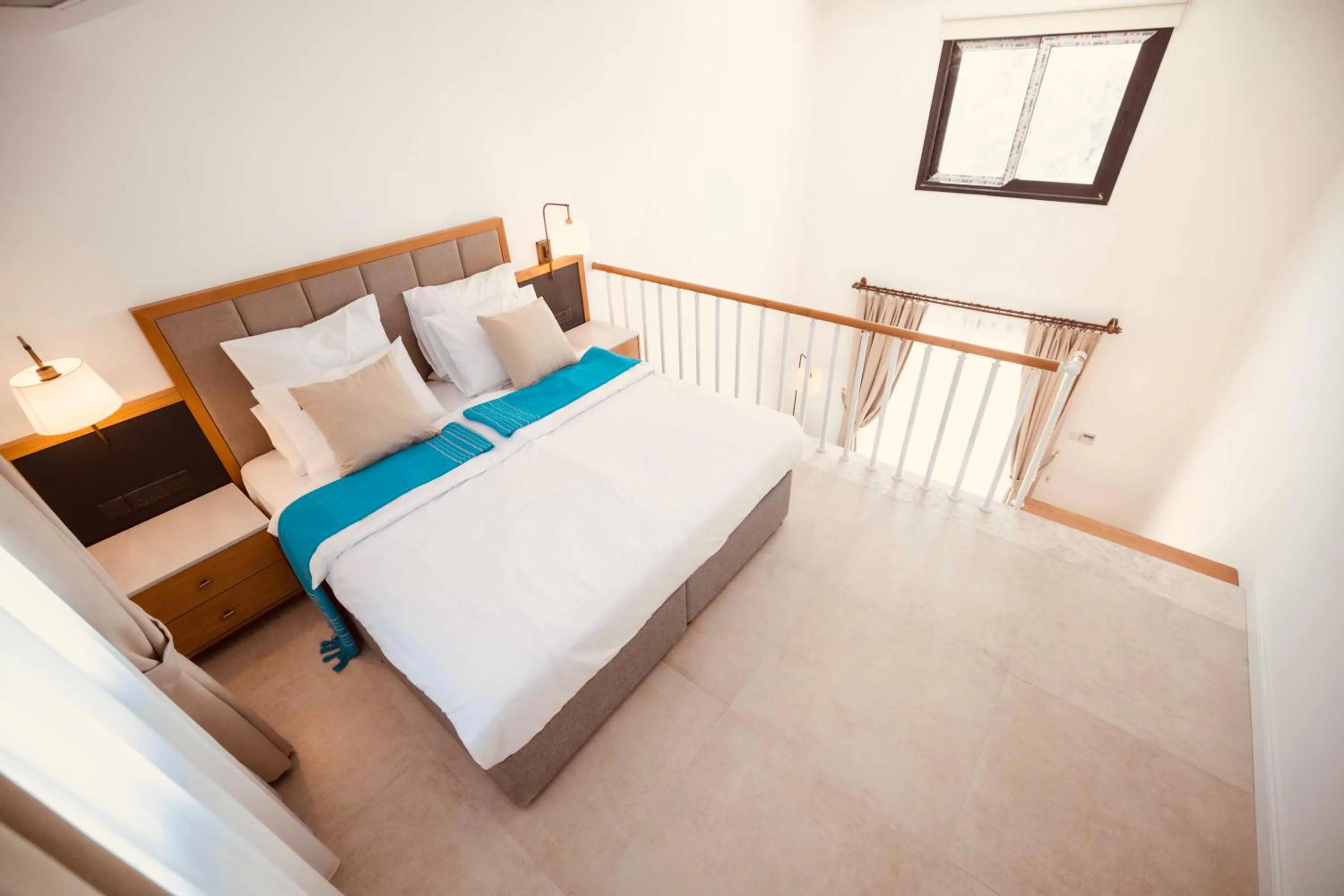 Bed in Palmonte Suites Hotel & SPA