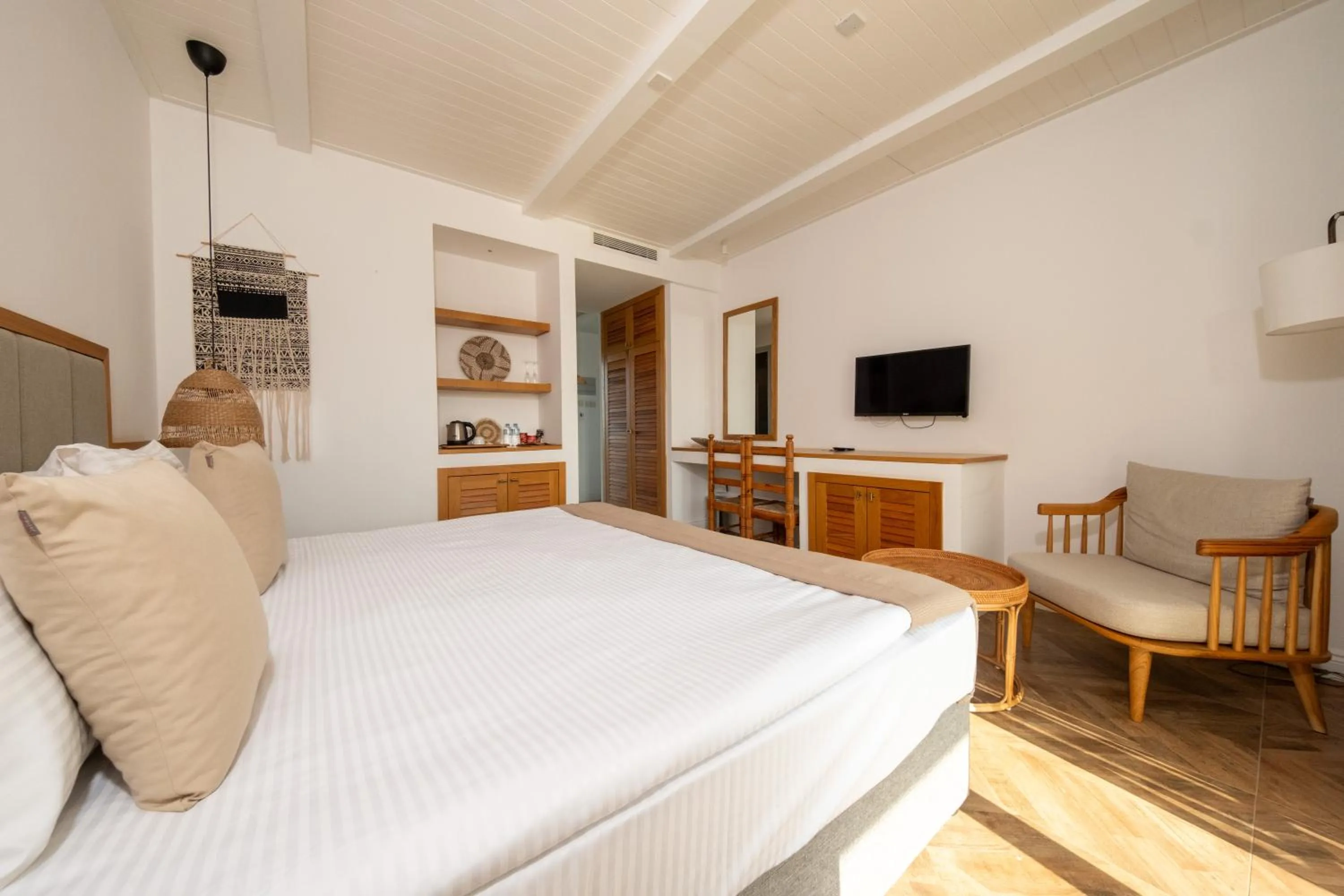 Bed in Palmonte Suites Hotel & SPA