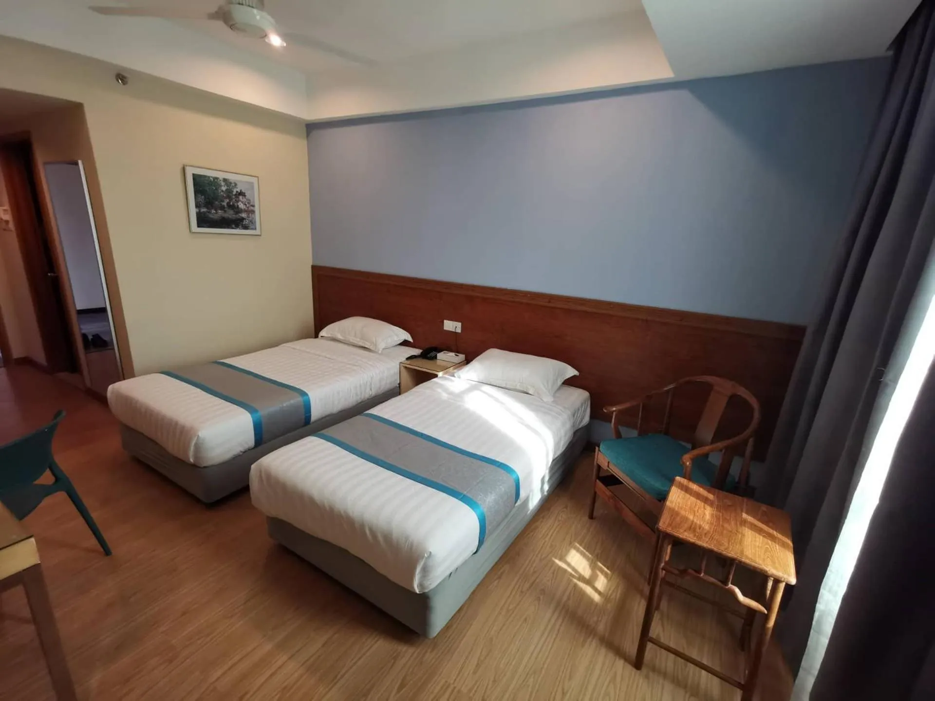 Bed in TD CAPITAL HOTEL