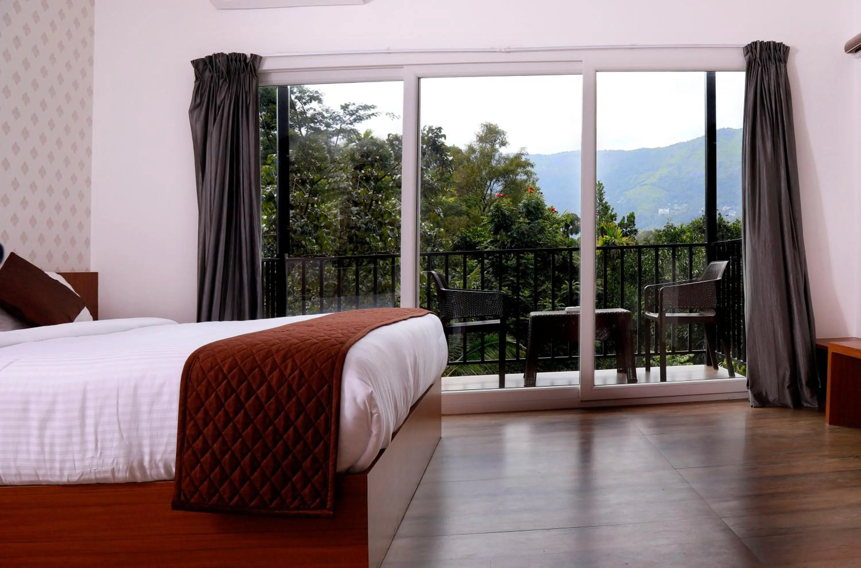 View (from property/room), Bed in Santhi Hill View Resort