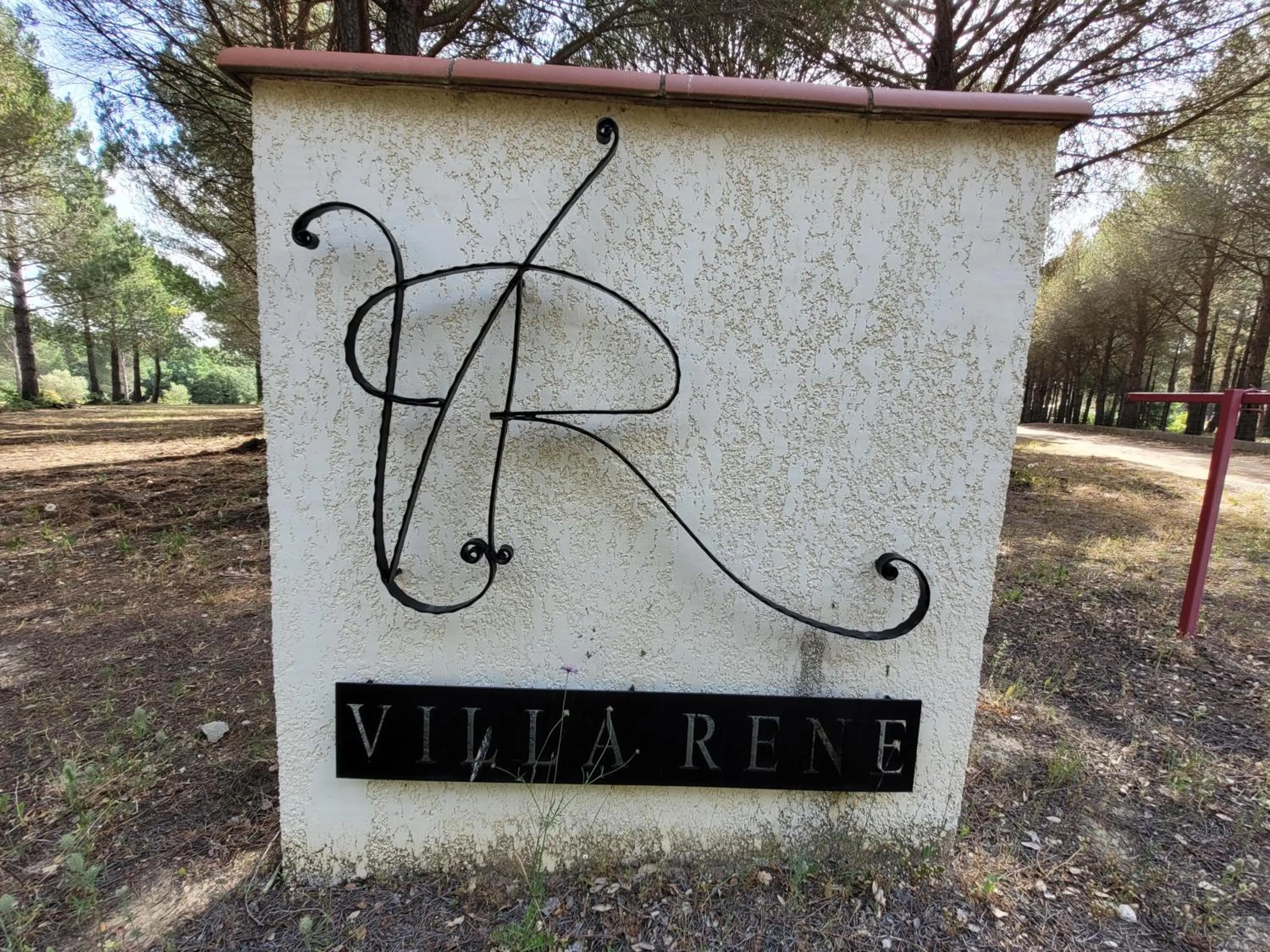 Property logo or sign in Villa RENE