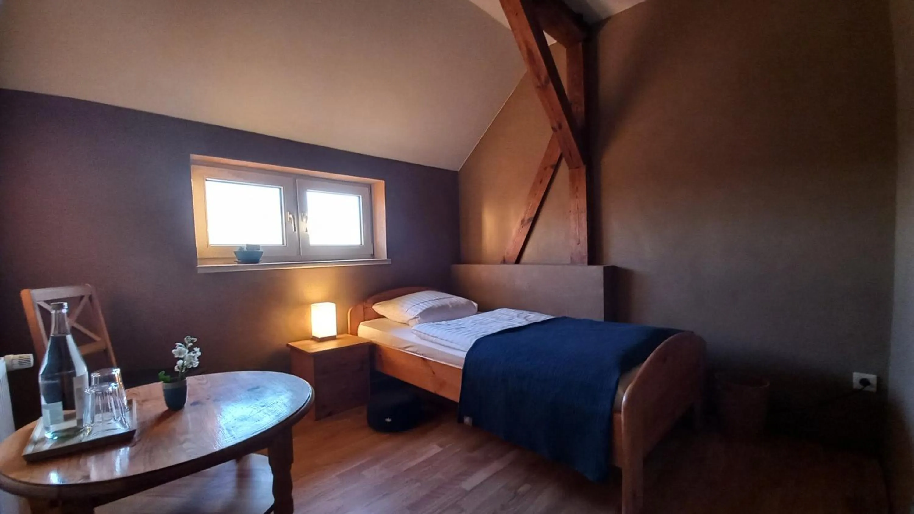 Bed in Triskele Haus - Ökologisches Gästehaus der Heilstätte Strelitz