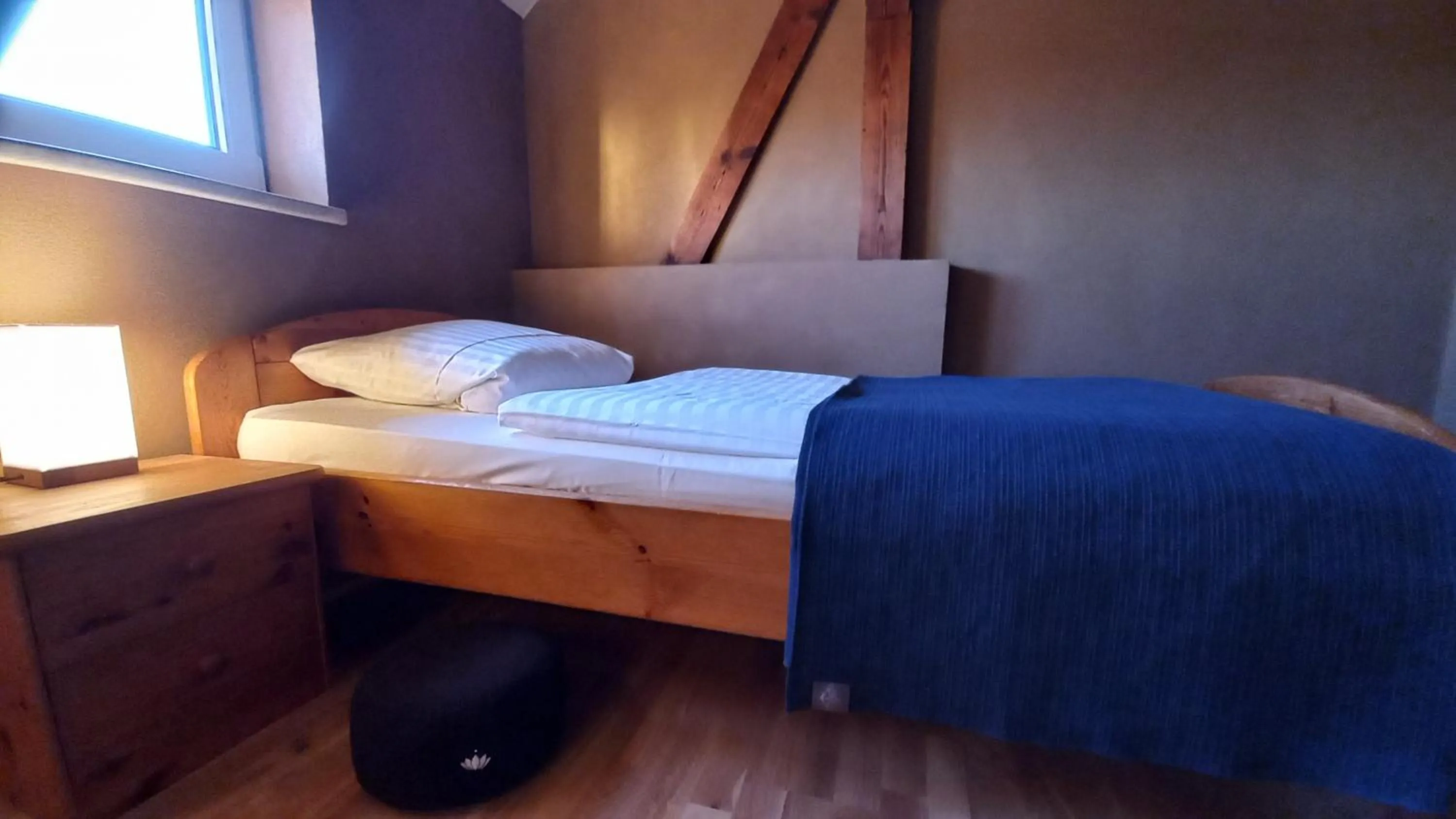 Photo of the whole room, Bed in Triskele Haus - Ökologisches Gästehaus der Heilstätte Strelitz