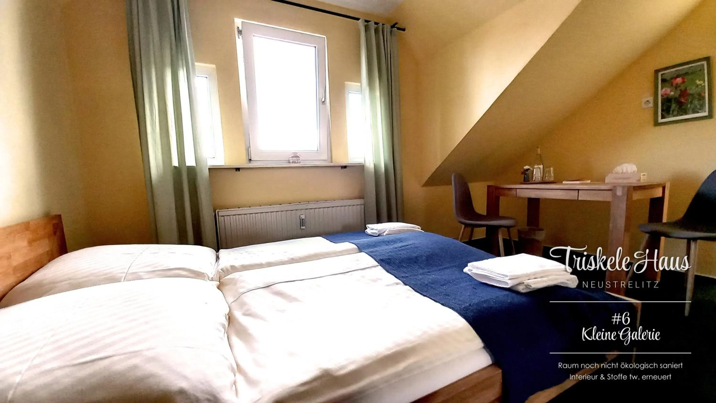 Bed in Triskele Haus - Ökologisches Gästehaus der Heilstätte Strelitz