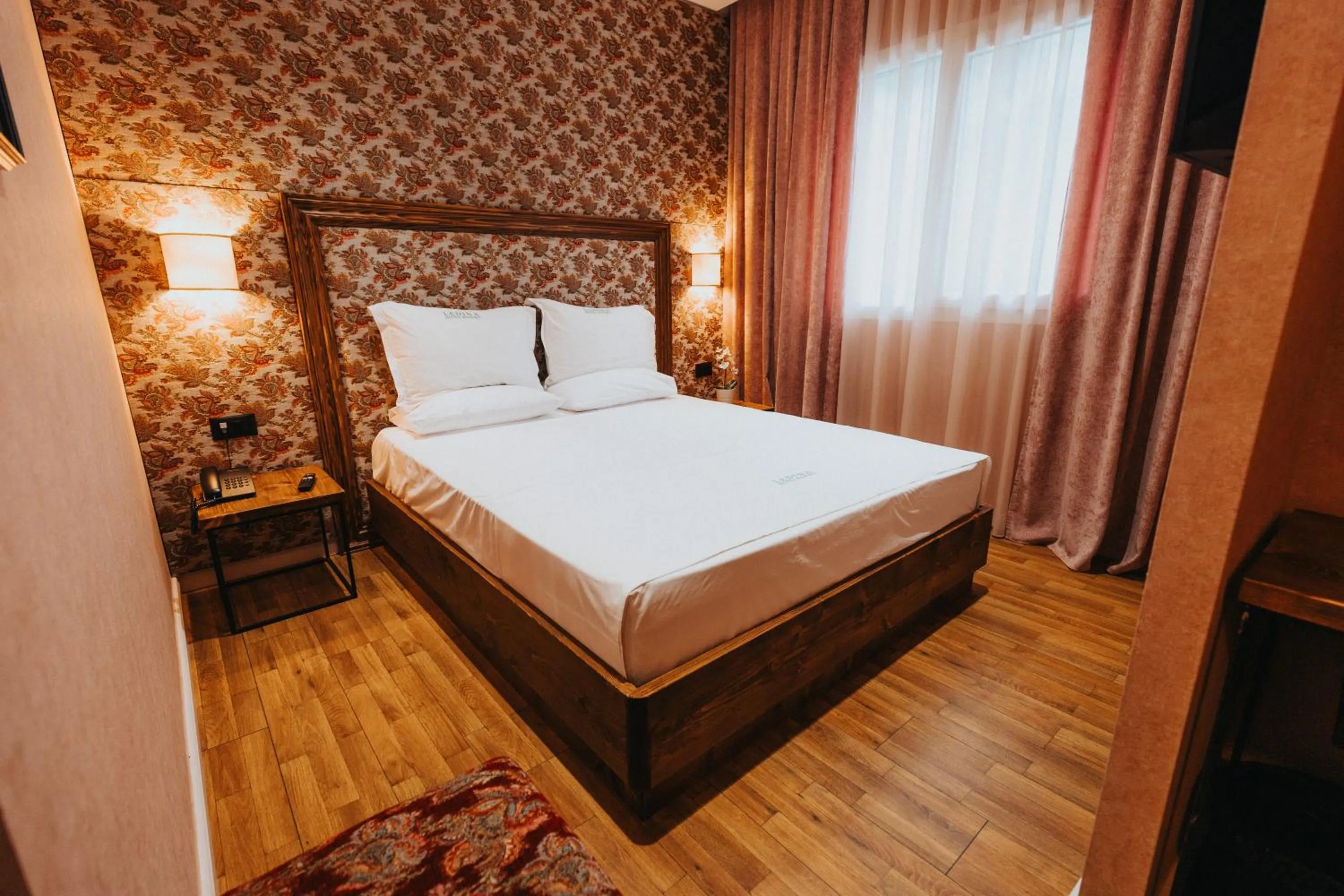 Bed in Ledina Hotel