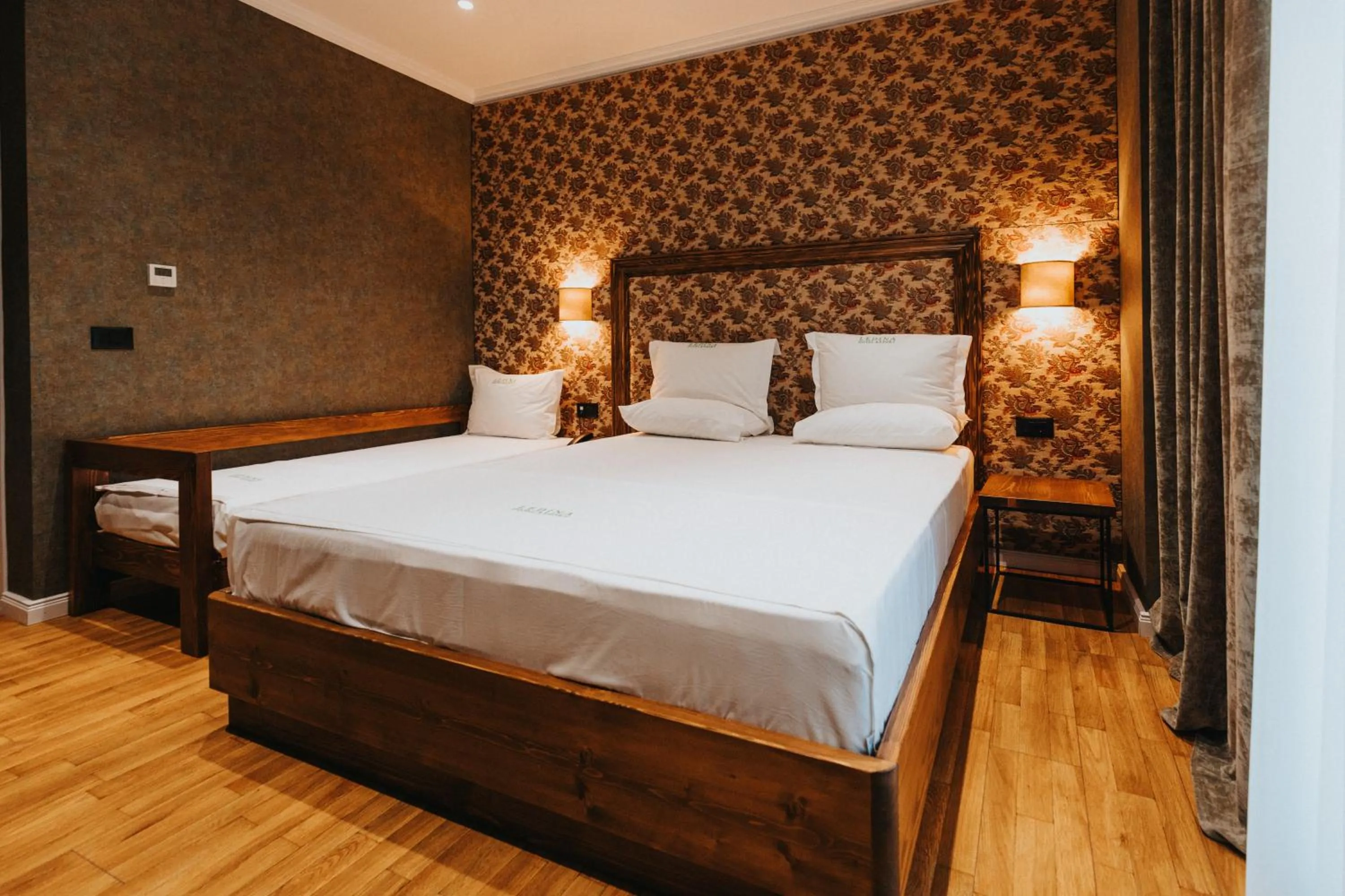 Bed in Ledina Hotel