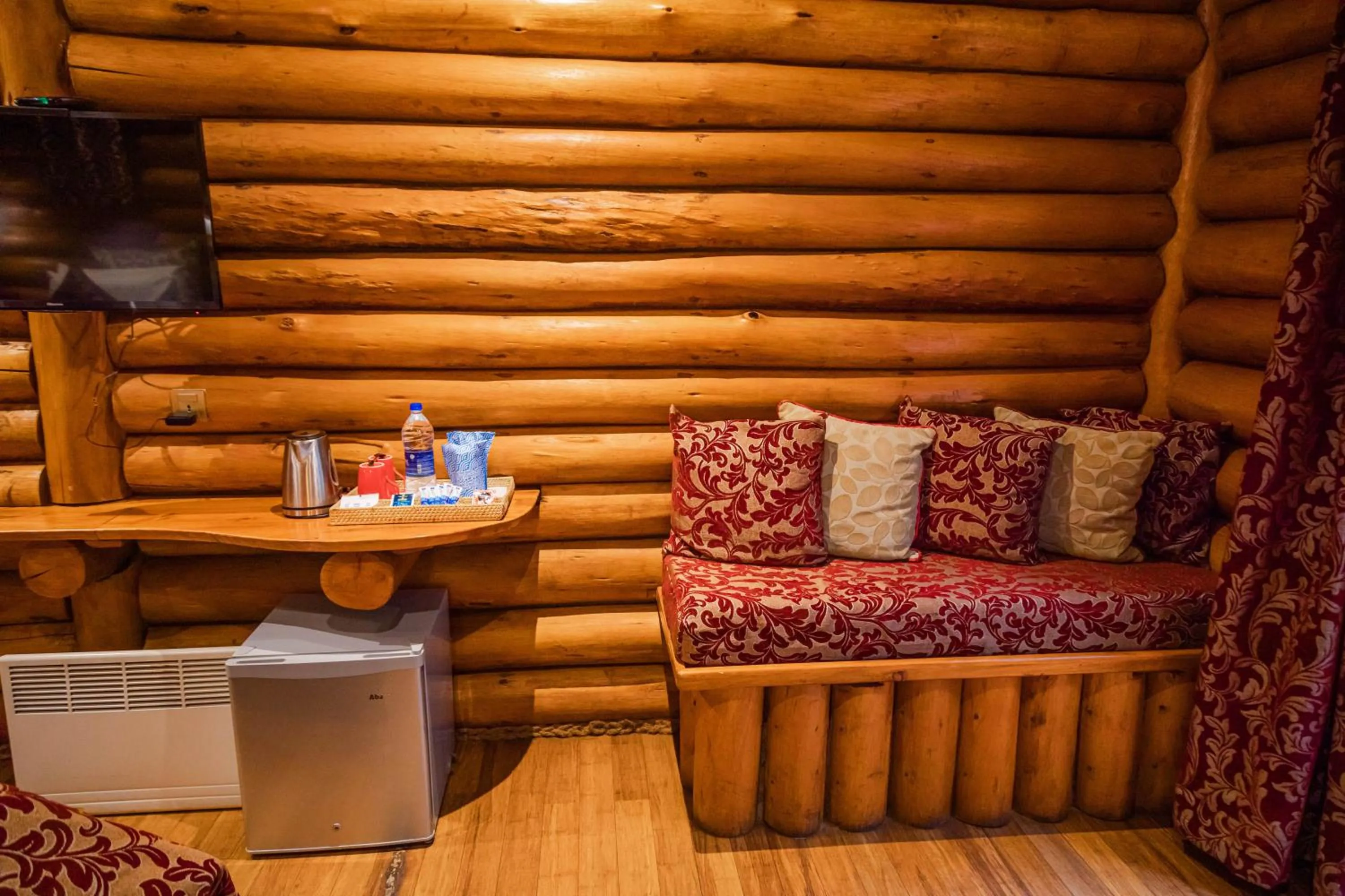 Seating area in Queenswood Cottage