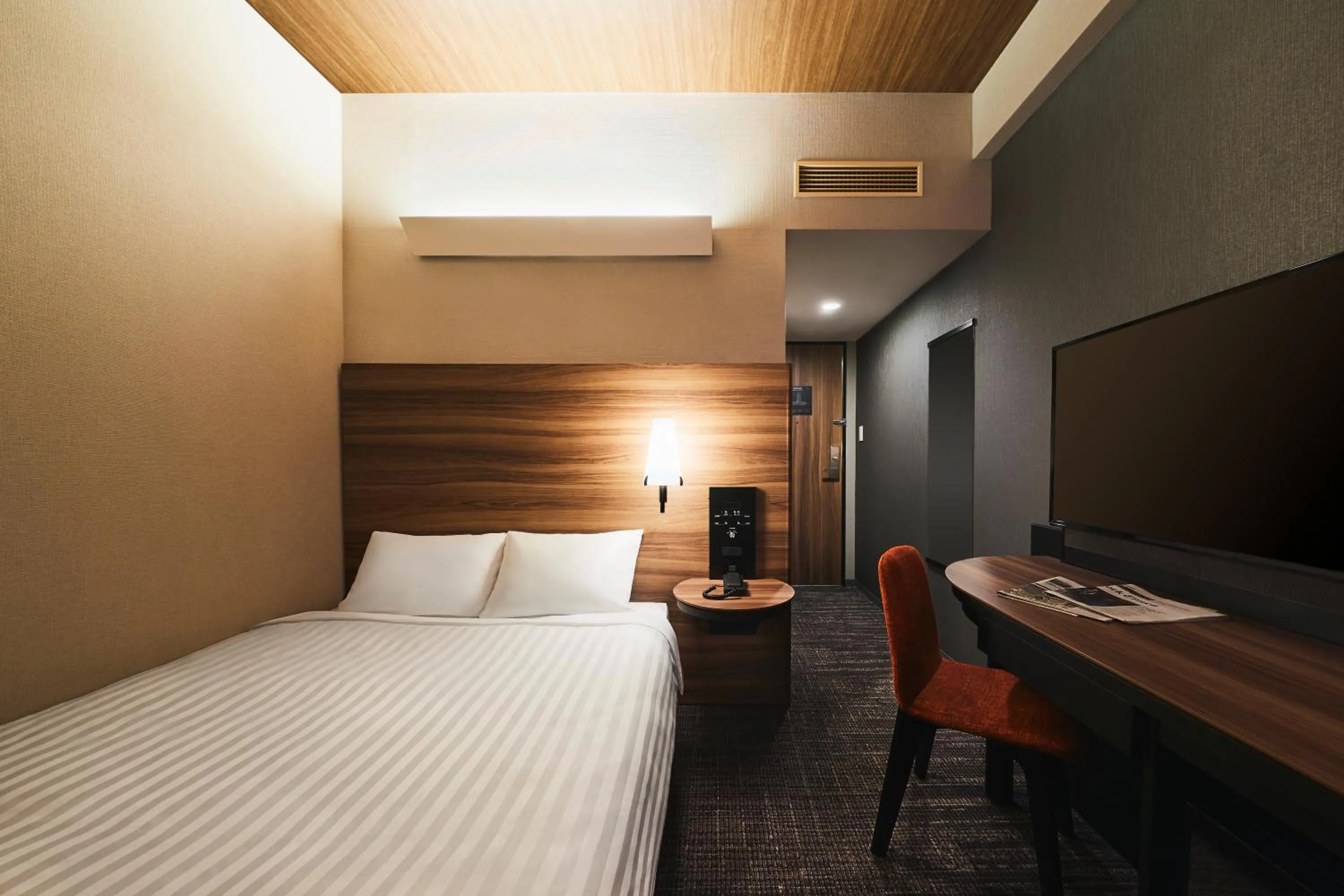 Bed in RIHGA PLACE HIGOBASHI