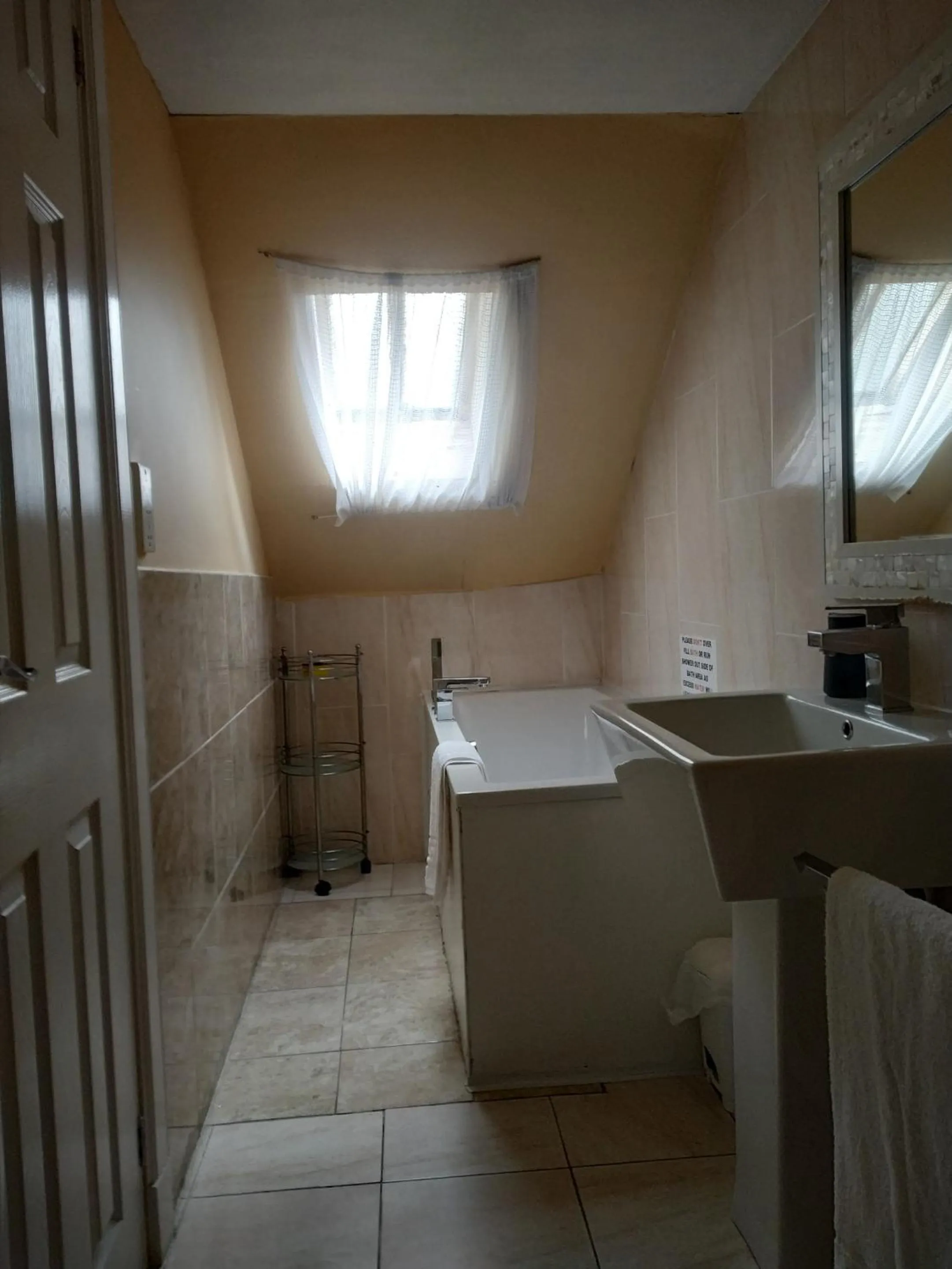 Bathroom in Busby Apartments